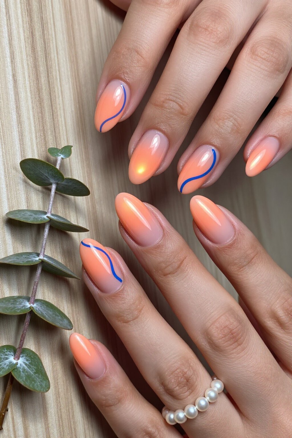 Vibrant Short Almond Coral Aura Nails with Swirl Art - short aura nails