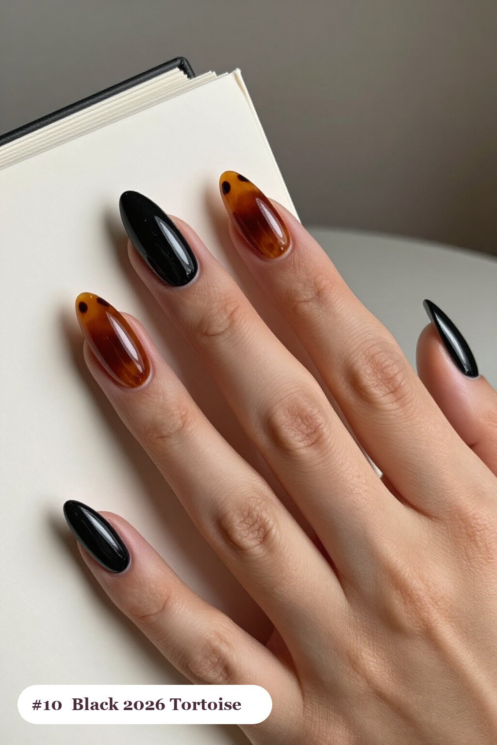 Black Almond Nails Featuring Glossy Amber Tortoiseshell Accents - 2026 halloween acrylic nails Black Almond Nails Featuring Glossy Amber Tortoiseshell Accents - 2026 halloween acrylic nails