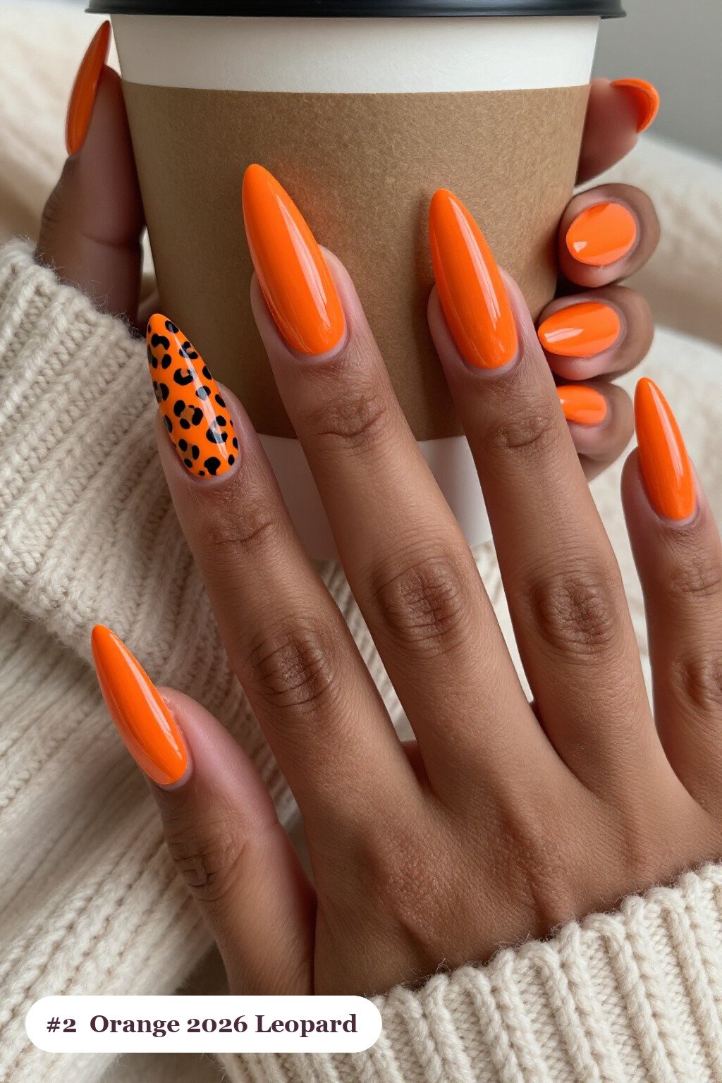 Orange Stiletto Nails with Leopard Accent Prints for 2026 Halloween Acrylic - 2026 halloween acrylic nails Orange Stiletto Nails with Leopard Accent Prints for 2026 Halloween Acrylic - 2026 halloween acrylic nails