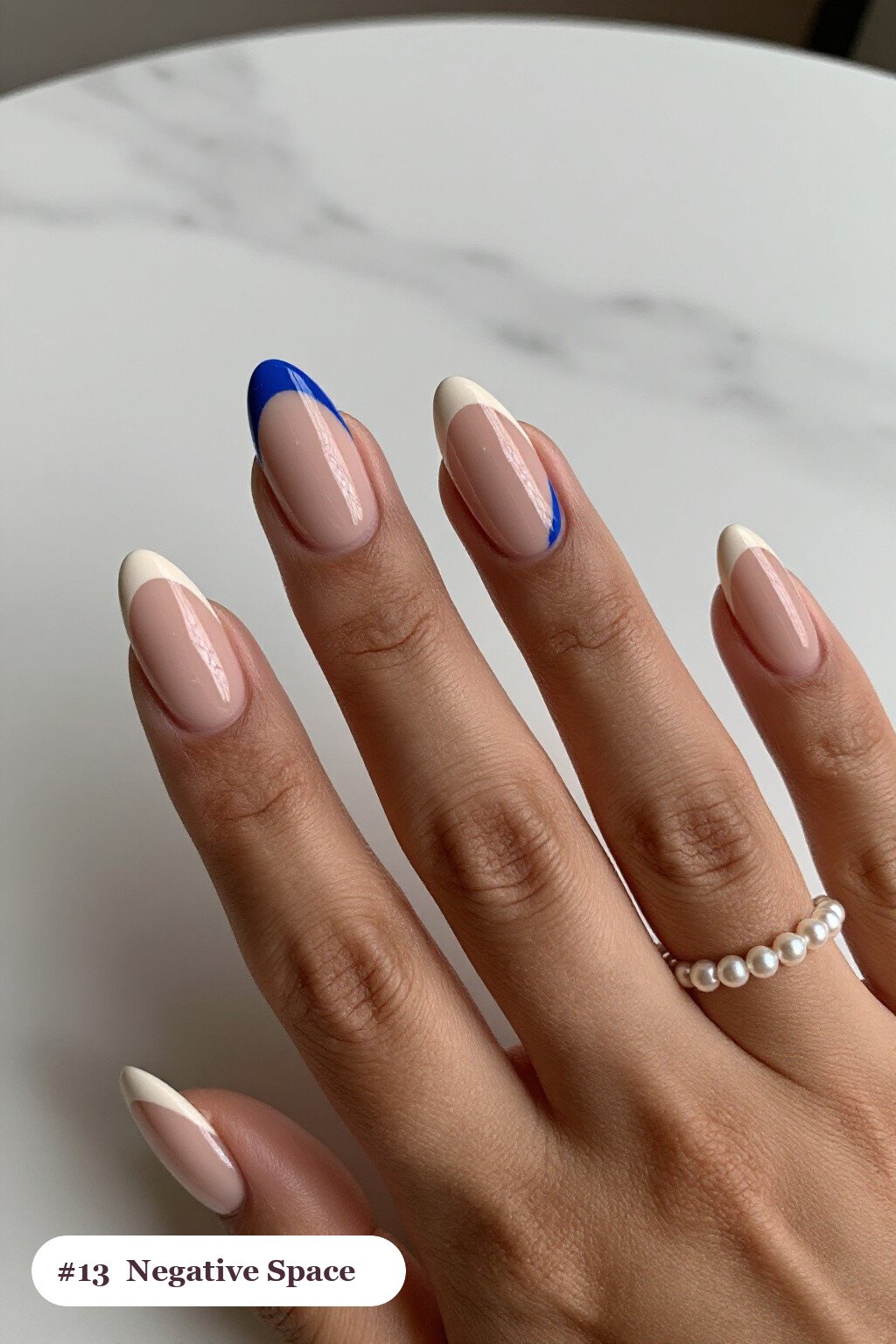 Nude Beige Almond Nails in Negative‑Space with Bold Colour Shapes - almond nails
