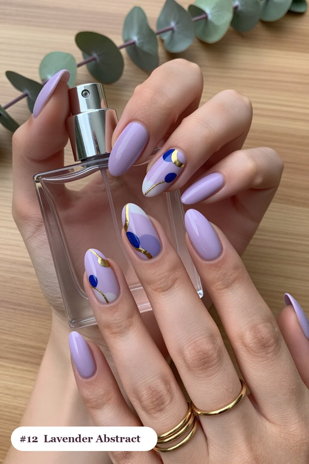 Lavender Almond Nails Showcasing Abstract Color Blobs and Gold Details - almond nails designs Lavender Almond Nails Showcasing Abstract Color Blobs and Gold Details - almond nails designs