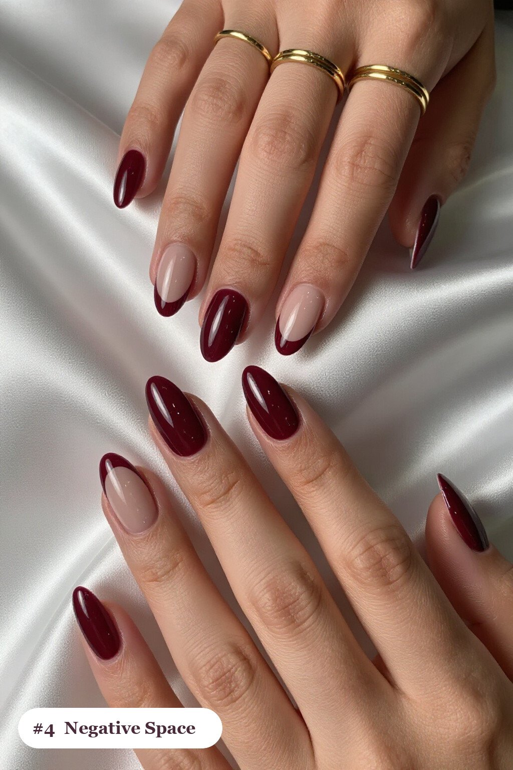 Burgundy Negative‑Space Almond Nails with Sheer Nude Windows - almond nails designs Burgundy Negative‑Space Almond Nails with Sheer Nude Windows - almond nails designs