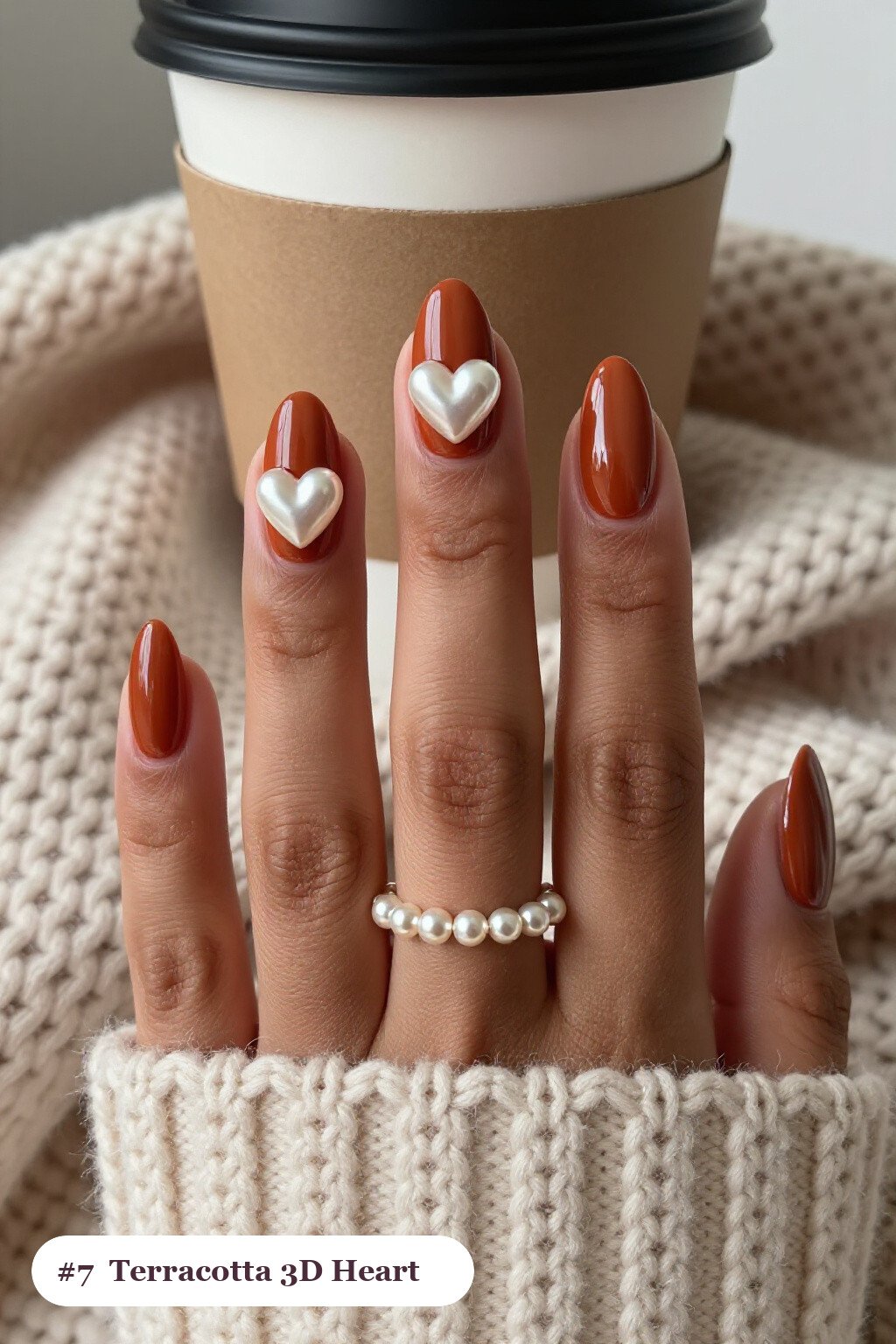 Terracotta Almond Nails Adorned with Chunky 3D Gel Hearts and Pearls - almond thanksgiving nail designs Terracotta Almond Nails Adorned with Chunky 3D Gel Hearts and Pearls - almond thanksgiving nail designs