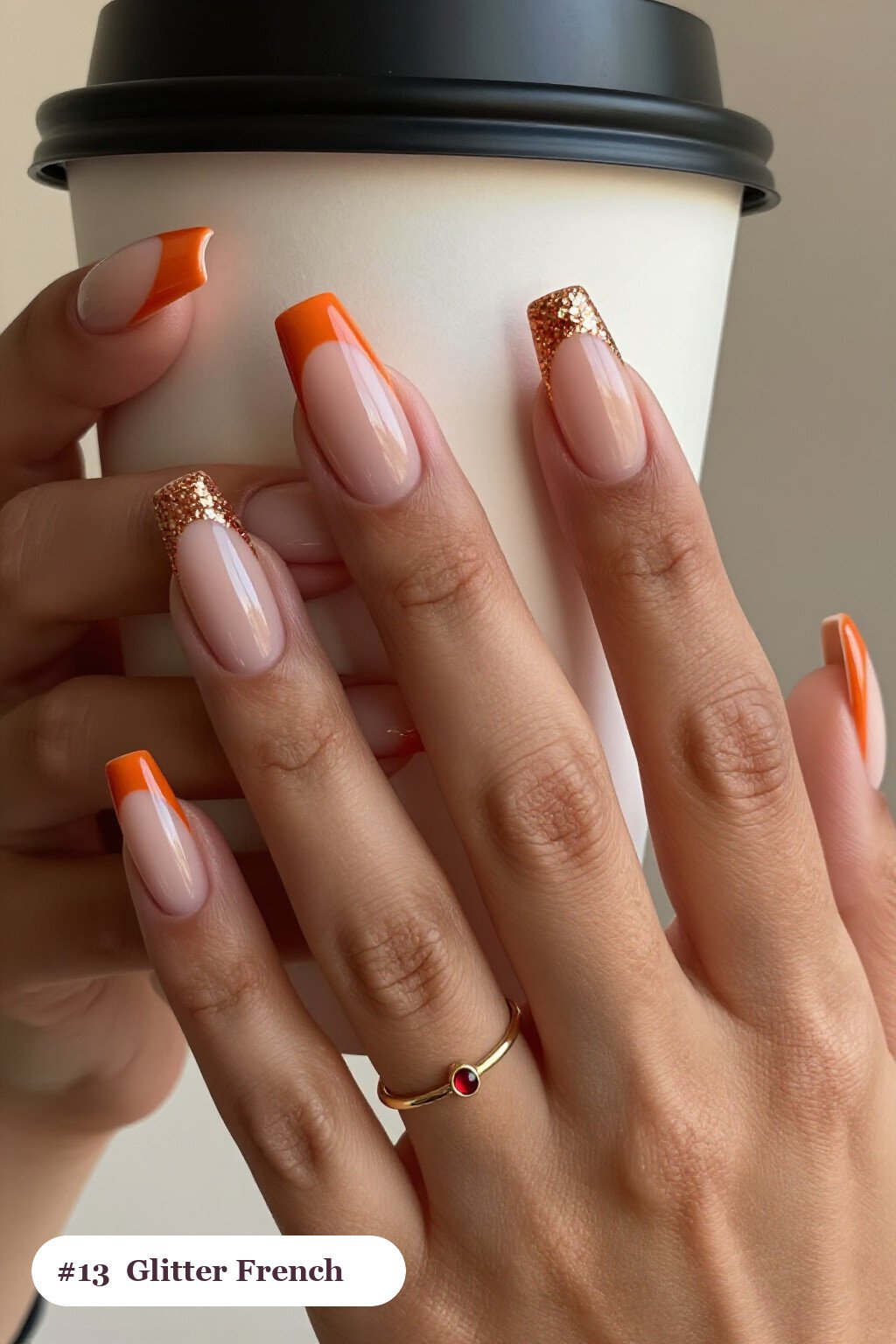 Long square burnt orange 2026 nails with glitter-packed french tips over a sheer nude base, perfect for autumn - autumn nails 2026