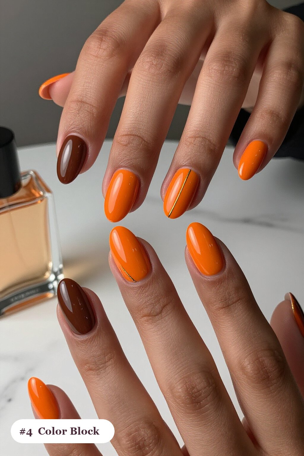 Medium Almond Brown‑Orange Diagonal Color‑Block Nails with Thin Gold Line - brown and orange fall nails Medium Almond Brown‑Orange Diagonal Color‑Block Nails with Thin Gold Line - brown and orange fall nails