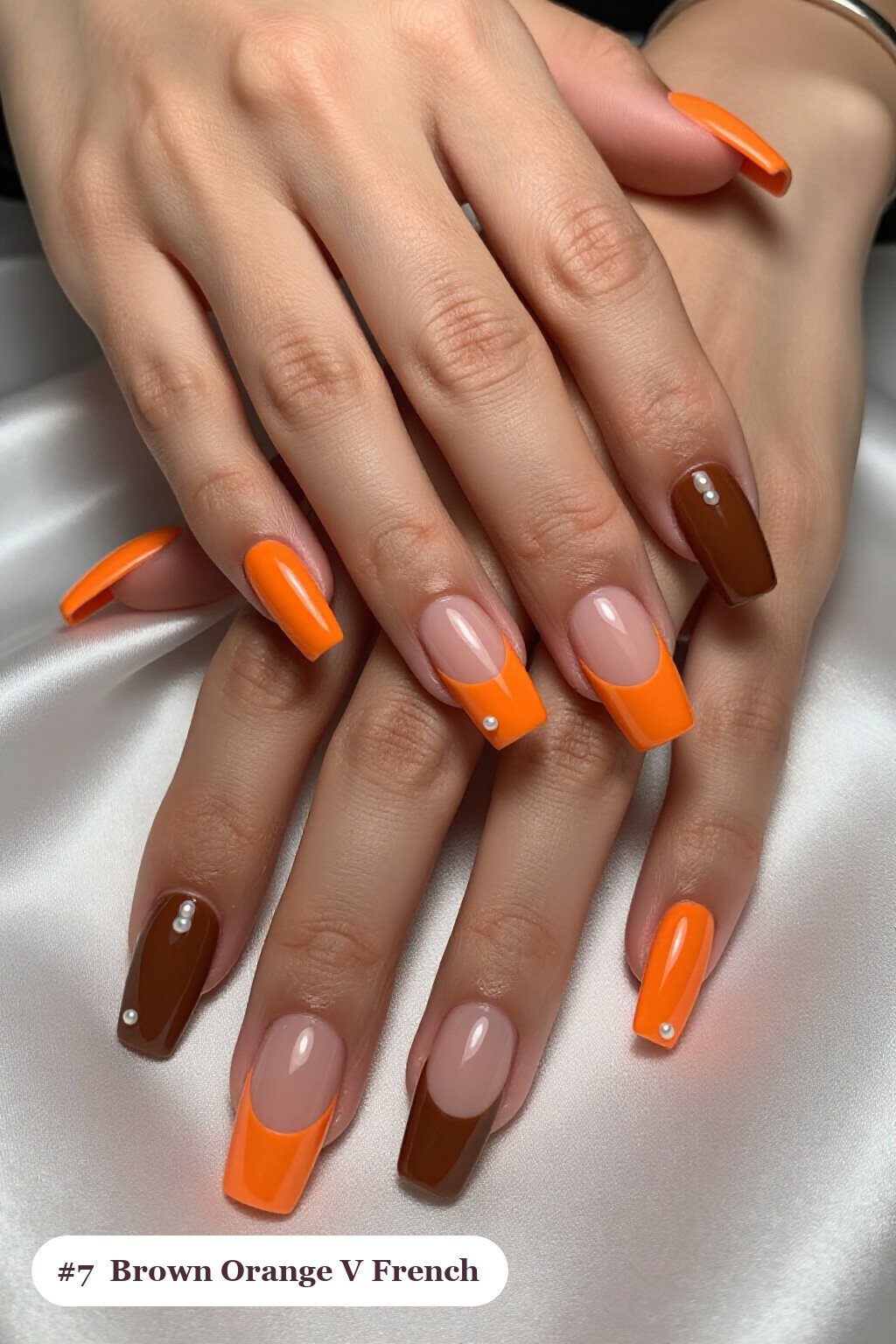 Long Square Brown‑Orange V‑Shaped French Tips with Pearl Details - brown and orange fall nails Long Square Brown‑Orange V‑Shaped French Tips with Pearl Details - brown and orange fall nails