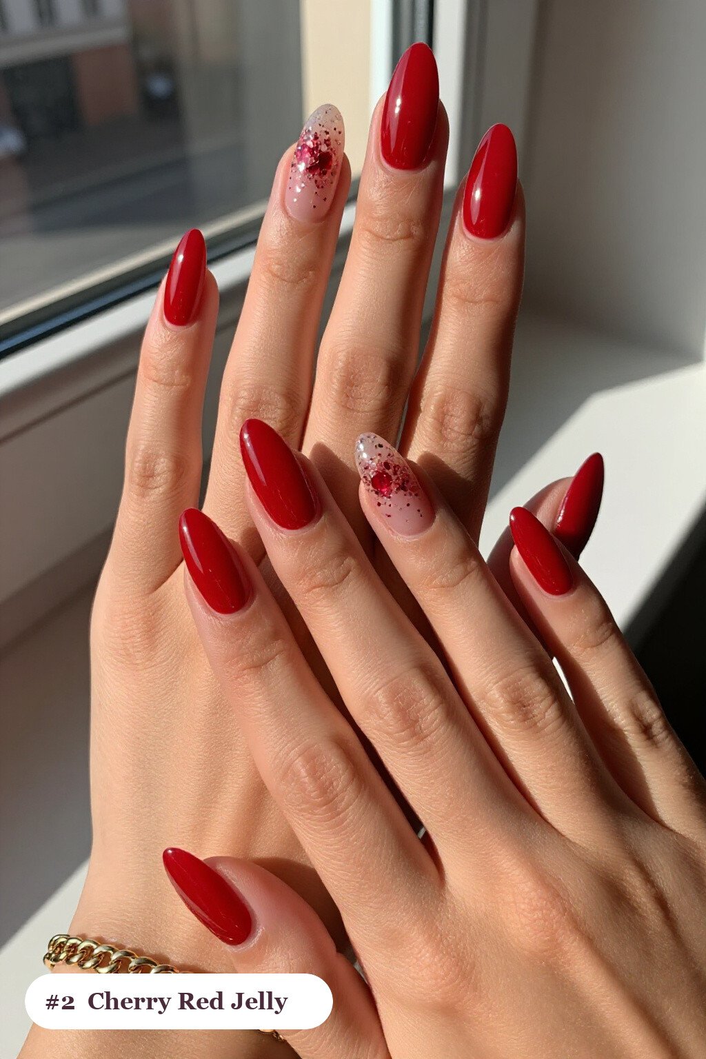 Jelly Cherry‑Red Almond Nails with Encapsulated Glitter - christmas almond nails