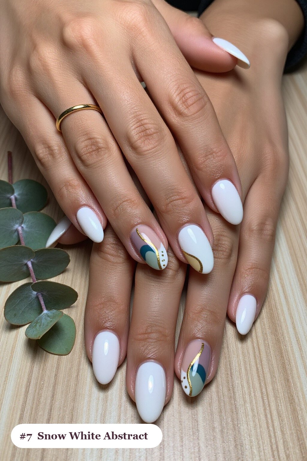 Snow‑White Abstract Art Christmas Almond Nails - christmas almond nails