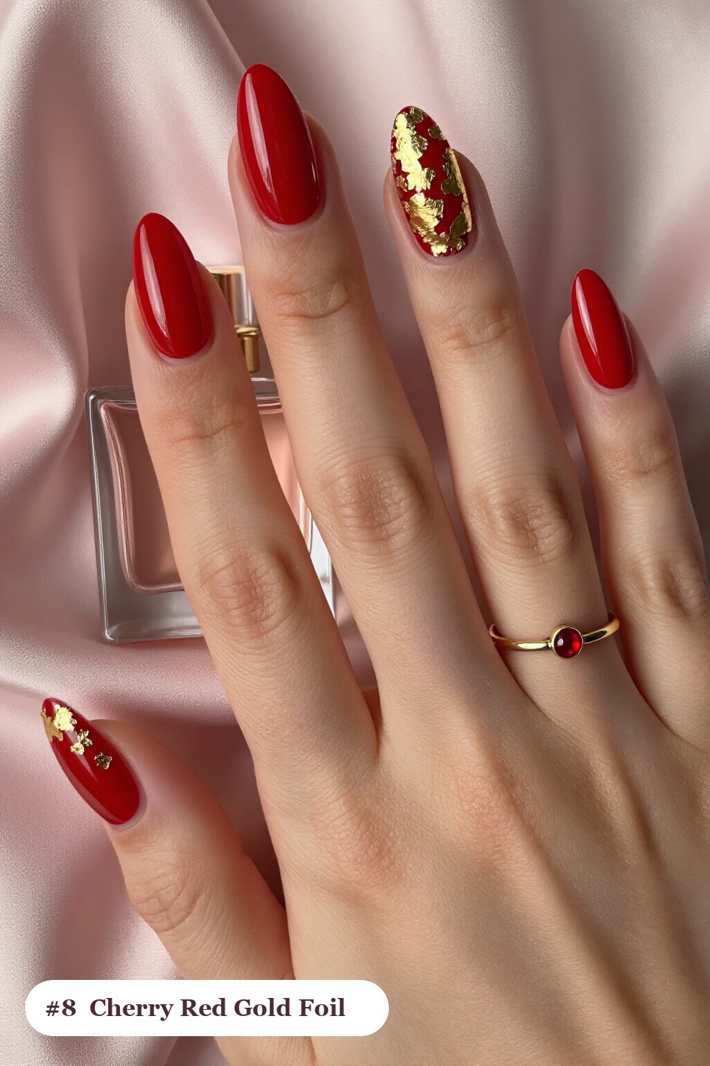 Cherry‑Red Almond Nails Drenched in Gold Foil Flakes - christmas almond nails