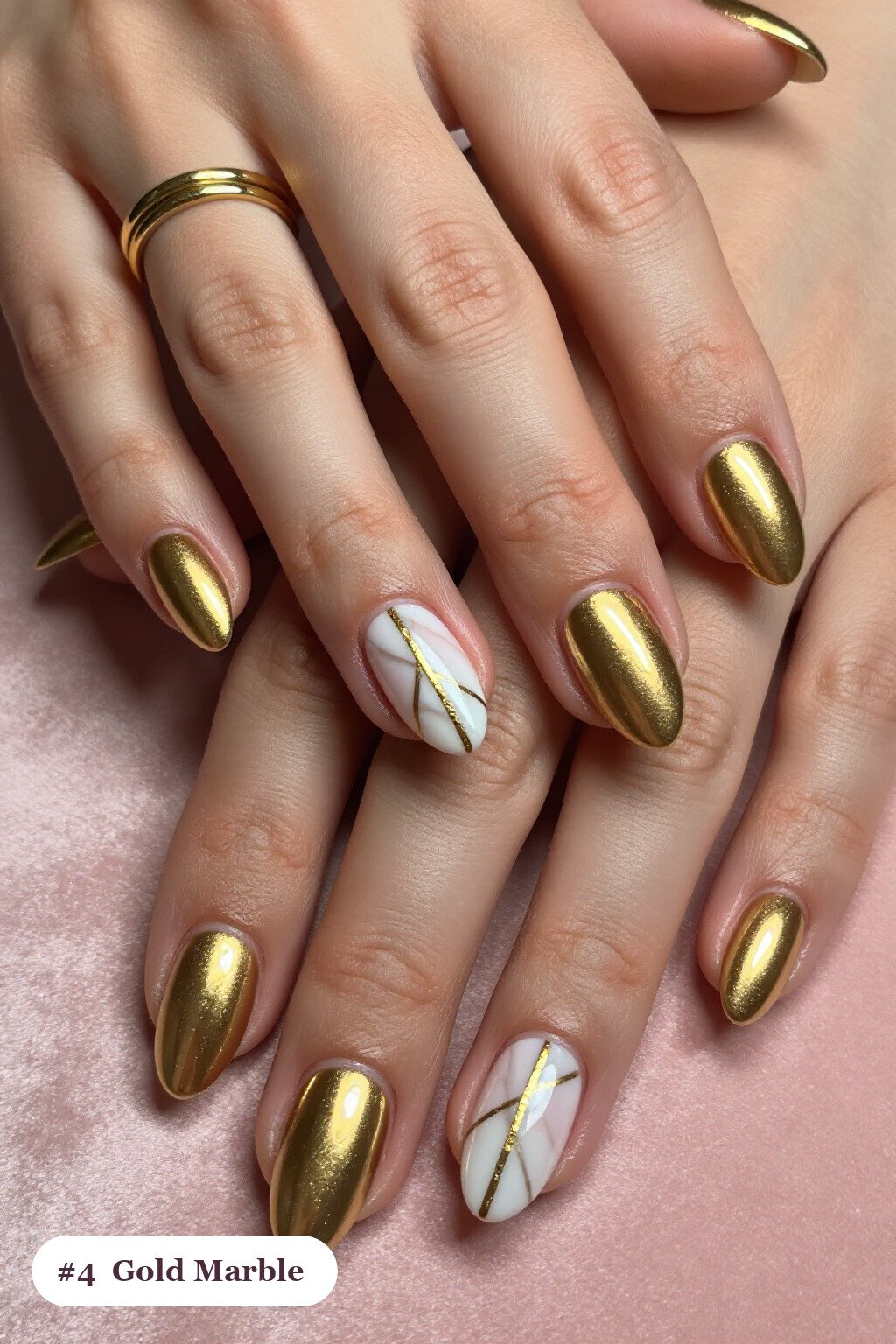 Gold Almond Nails Featuring Bold Marble Veins in White and Gold – Luxe Holiday Look - christmas almond nails short Gold Almond Nails Featuring Bold Marble Veins in White and Gold – Luxe Holiday Look - christmas almond nails short