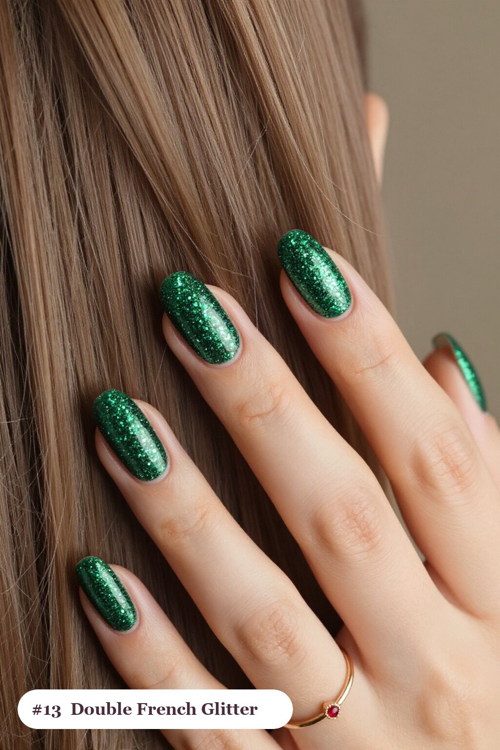 Medium oval emerald green glitter nails with sparkling glitter clearly visible on every nail, styled with double-line french tips in two colours, perfect for christmas - christmas glitter nails