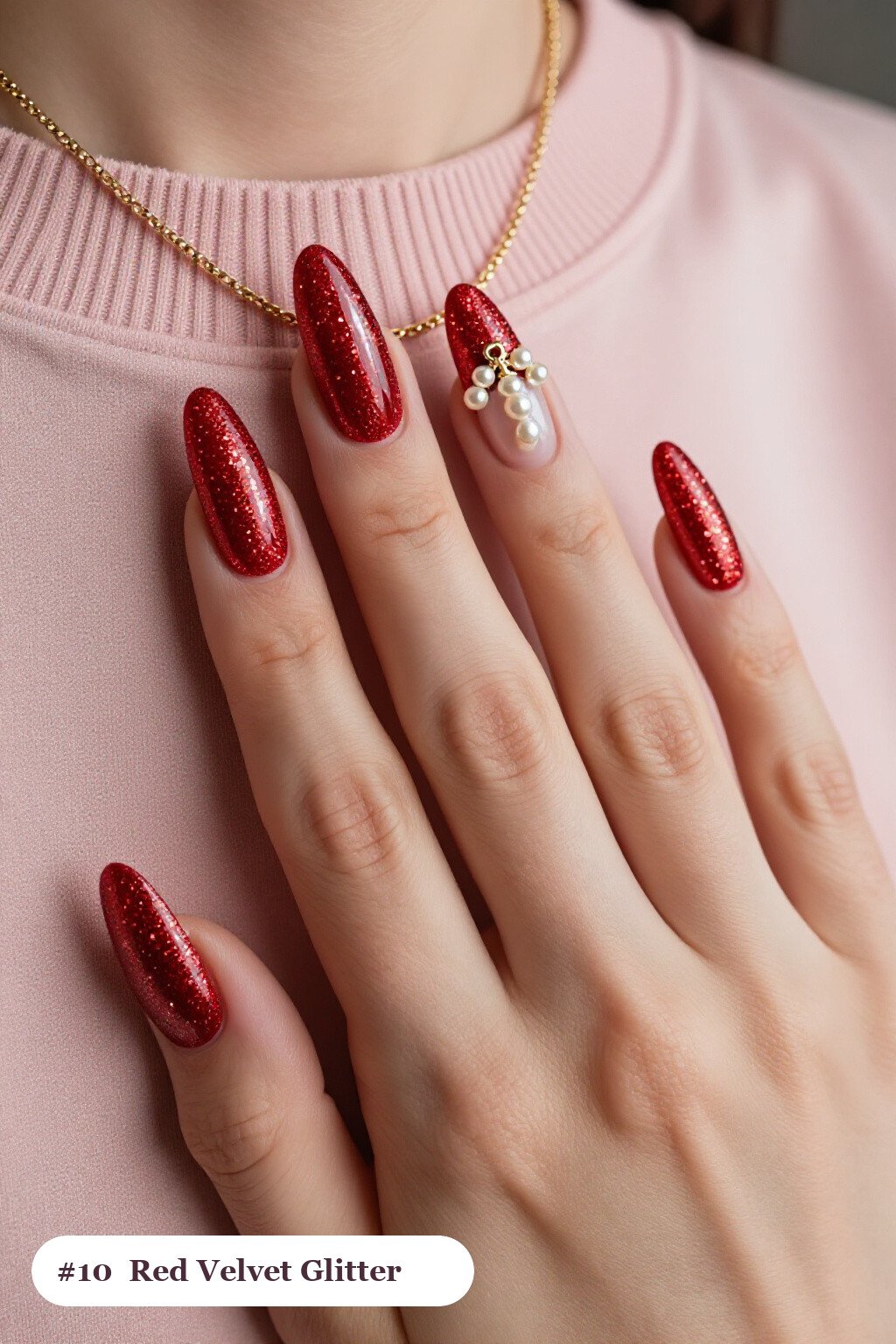 Long square glitter red nails with sparkling glitter clearly visible on every nail, styled with a velvet shimmer finish with one glossy accent nail with a gold charm, with pearl details, perfect for christmas - christmas glitter nails red