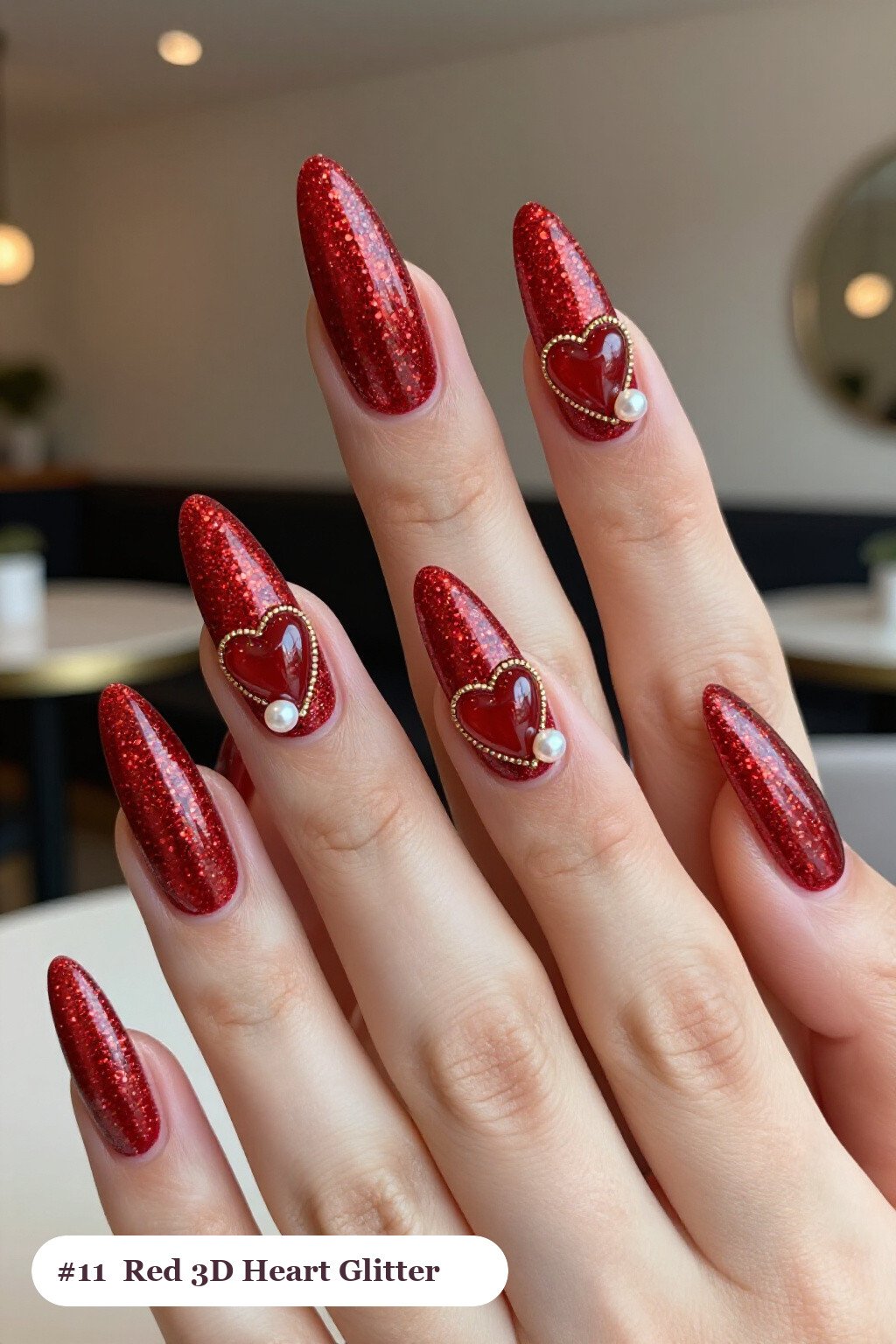 Long ballerina glitter red nails with sparkling glitter clearly visible on every nail, styled with chunky 3D gel hearts and pearls on three nails, with gold details, perfect for christmas - christmas glitter nails red