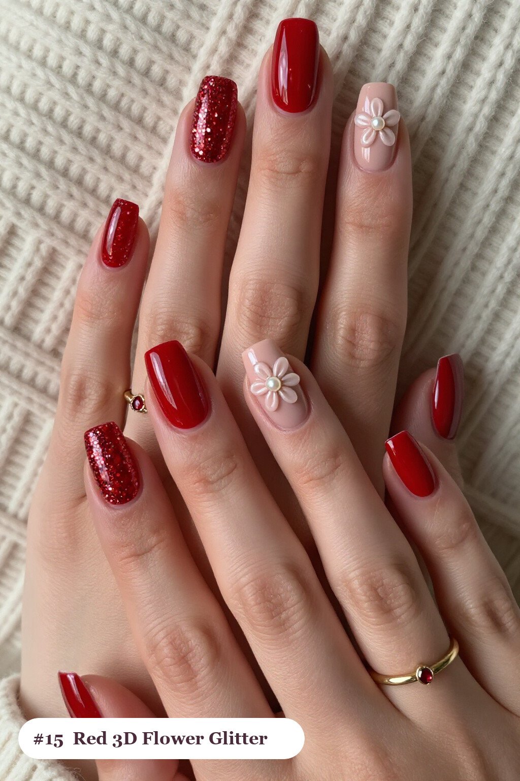 Short square glitter red nails with sparkling glitter clearly visible on every nail, styled with raised 3D flowers with pearl centres on two accent nails, with soft nude details, perfect for christmas - christmas glitter nails red