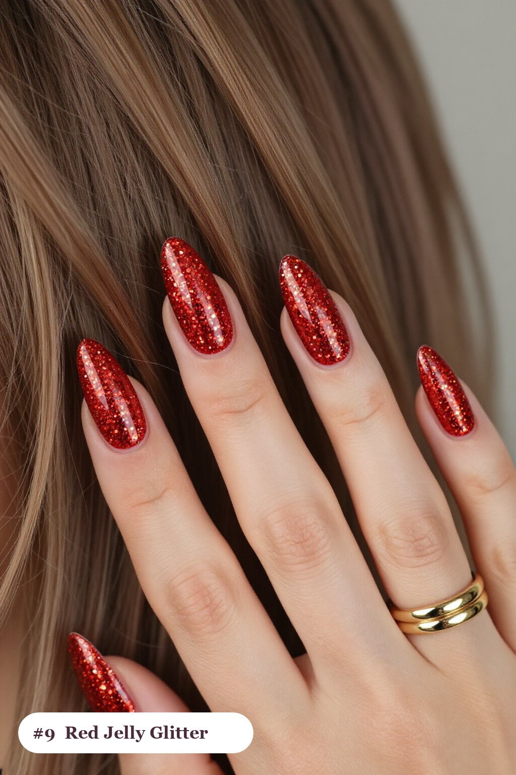 Long coffin glitter red nails with sparkling glitter clearly visible on every nail, styled with a see-through jelly finish with encapsulated glitter, with gold details, perfect for christmas - christmas glitter nails red
