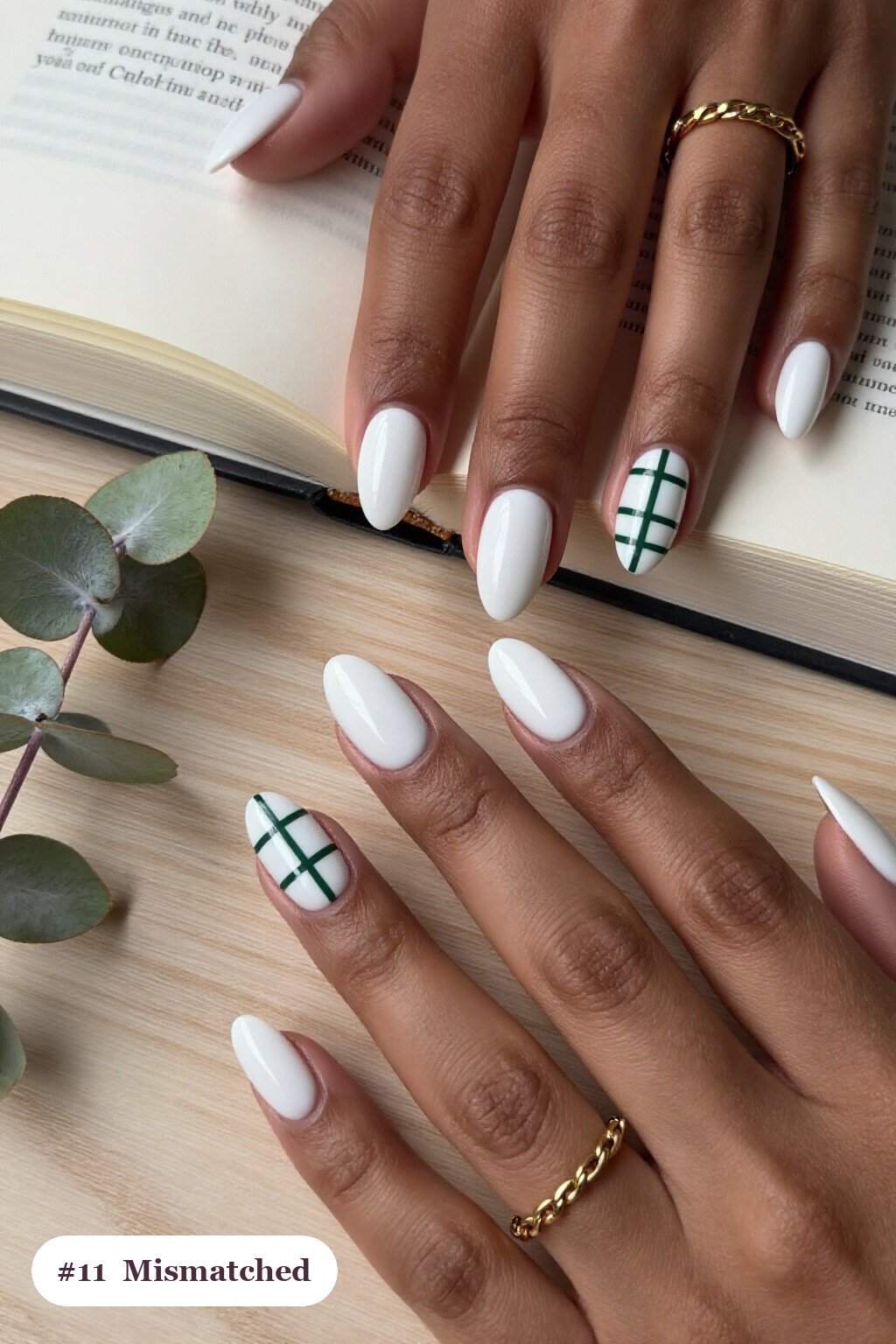 Snow White Oval Nails with Mismatched Patterns in a Unified Color Story - christmas manicure ideas 2026