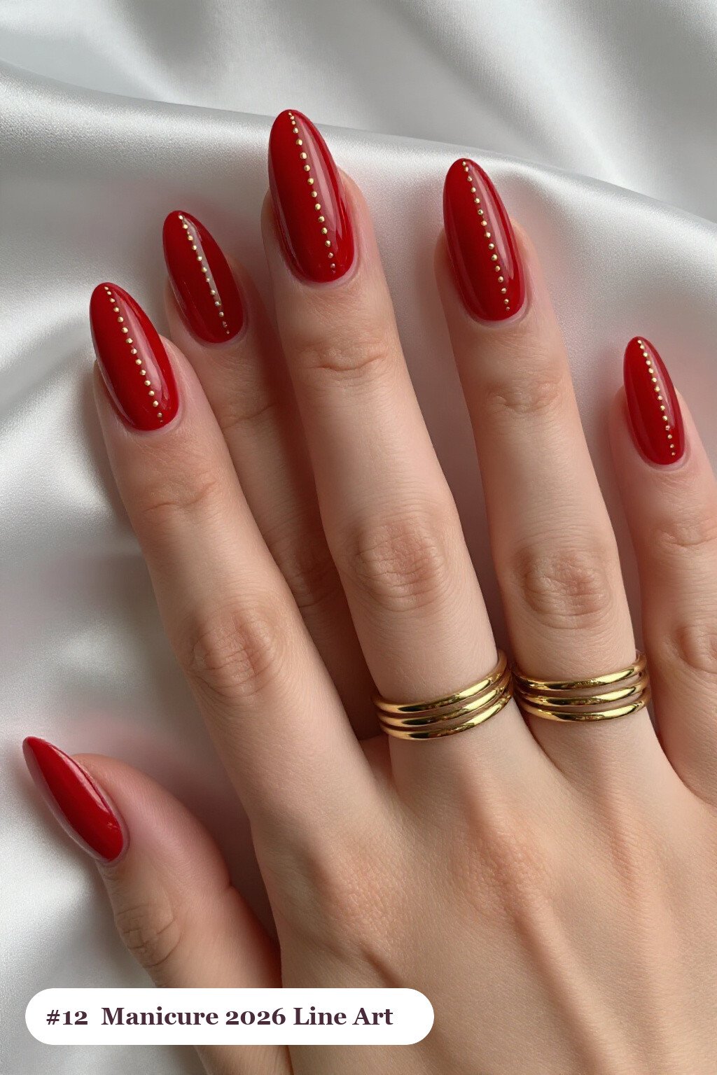 Cherry Red Ballerina Nails with Fine Gold Line Art and Tiny Dots - christmas manicure ideas 2026