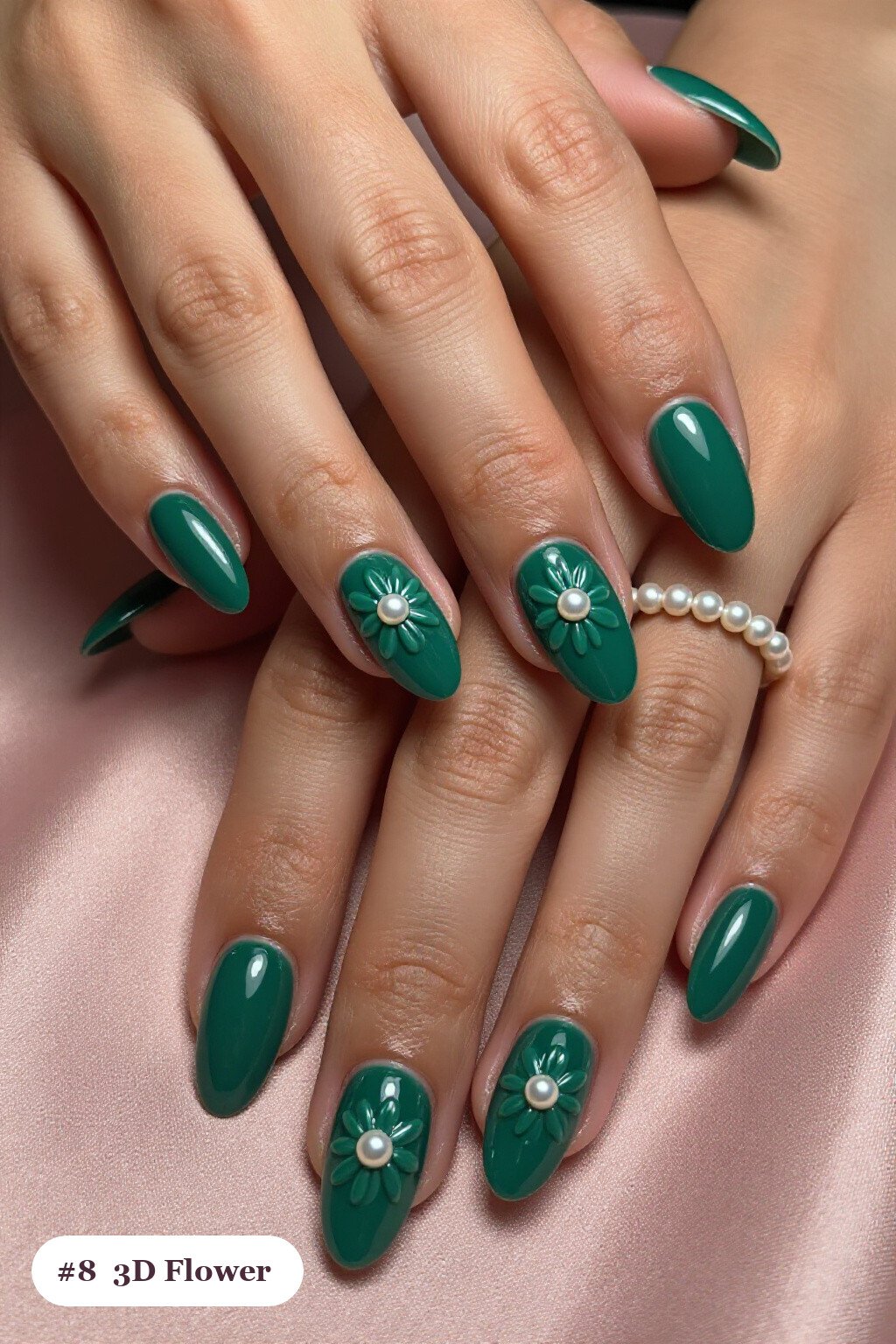 Emerald Green Almond Nails with 3D Pearl‑Center Flowers - christmas manicure ideas 2026