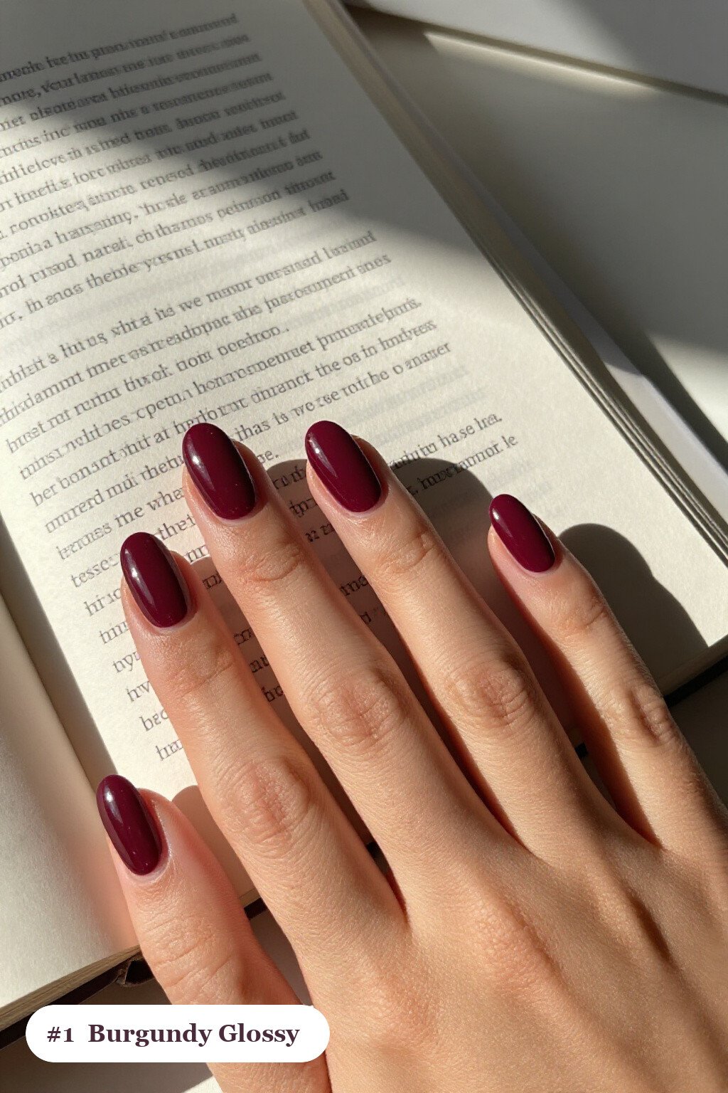 Medium coffin burgundy nails in a flawless mirror-glossy full-colour finish, perfect for christmas - christmas nail designs holiday