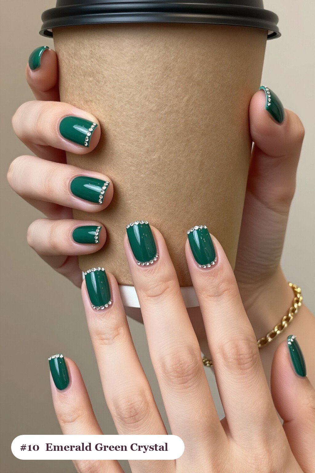 Short square emerald green nails with rows of sparkling crystal rhinestones along the cuticle of every nail, perfect for christmas - christmas nail designs holiday