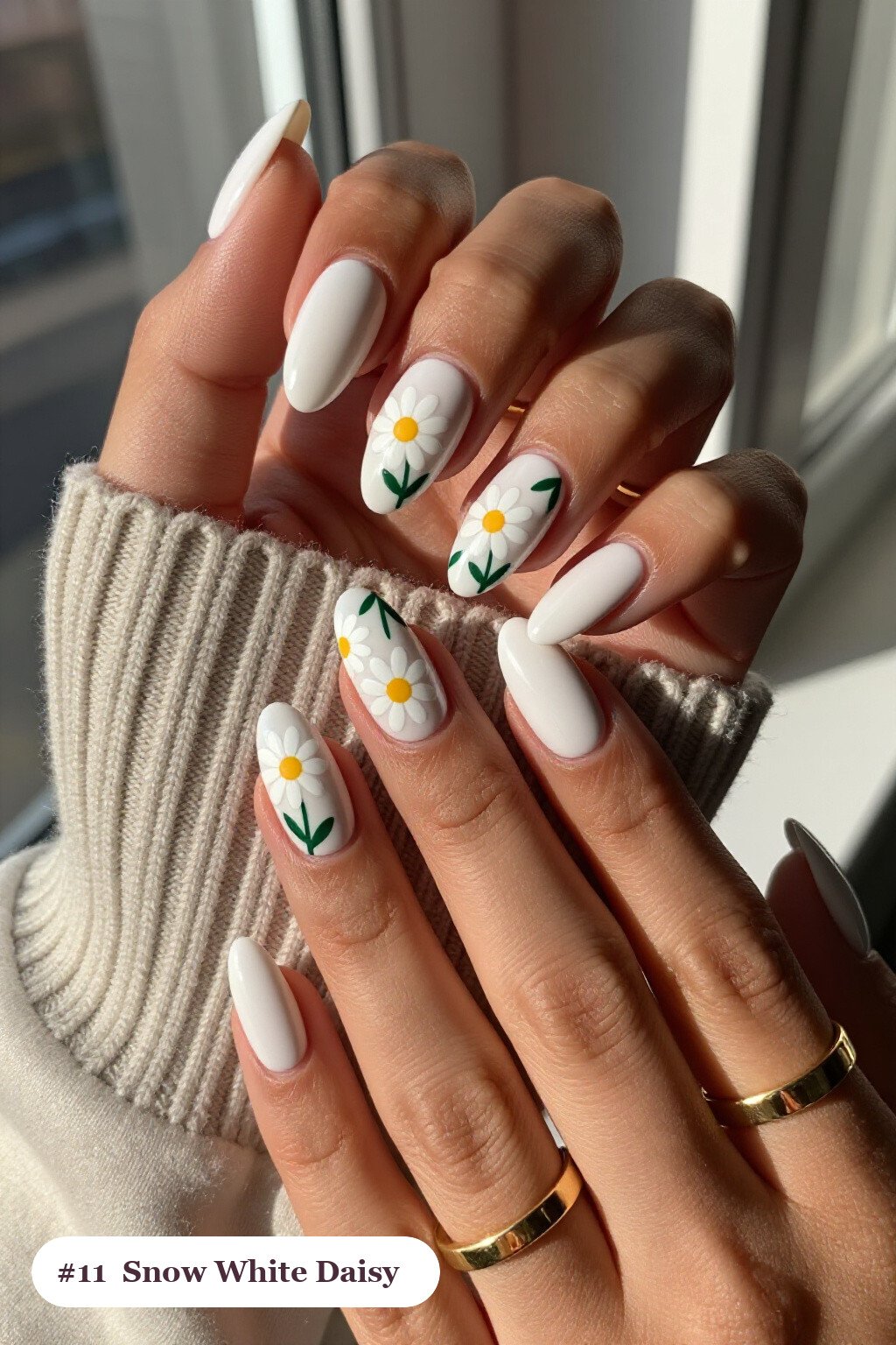 Medium coffin snow white nails with hand-painted daisies and green leaves across every nail, perfect for christmas - christmas nail designs holiday