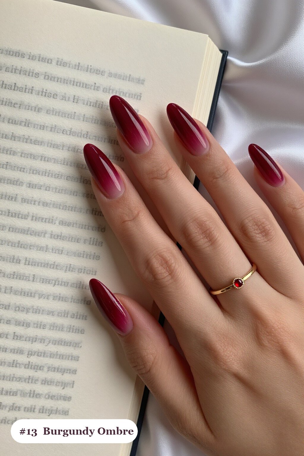 Long coffin burgundy nails with a vivid two-colour ombre melting from the cuticle to the tips, perfect for christmas - christmas nail designs holiday