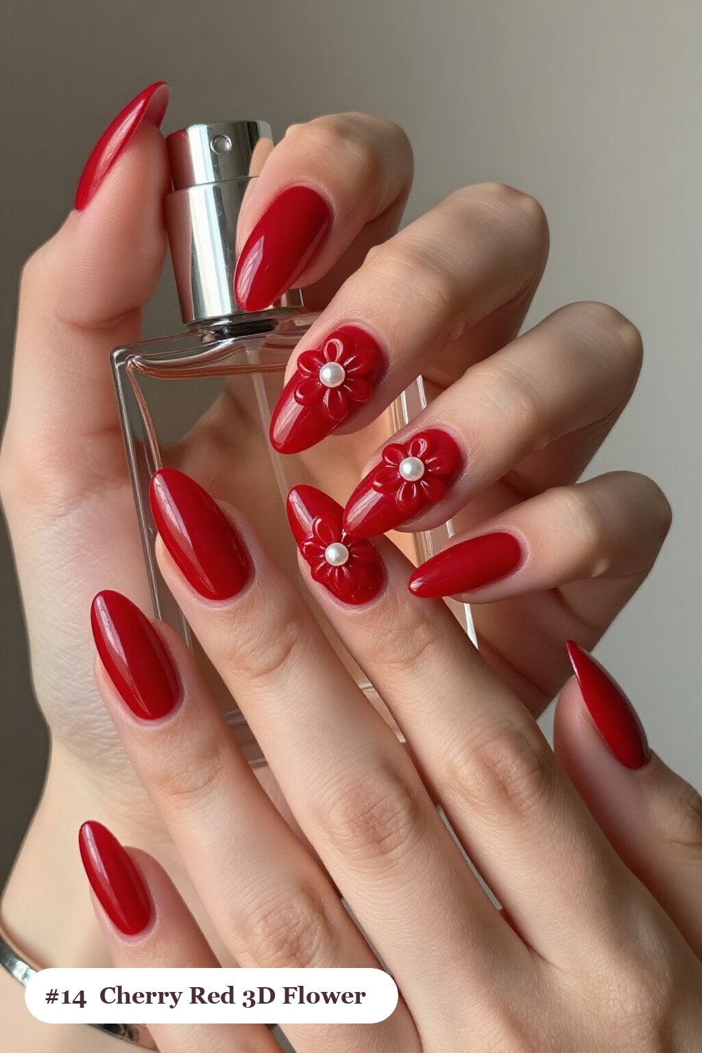 Long ballerina cherry red nails with raised 3D flowers with pearl centres on two accent nails, perfect for christmas - christmas nail designs holiday
