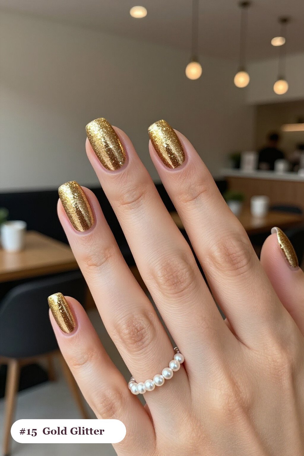 Medium oval gold nails with a sparkling glitter gradient rising from the cuticle, perfect for christmas - christmas nail designs holiday