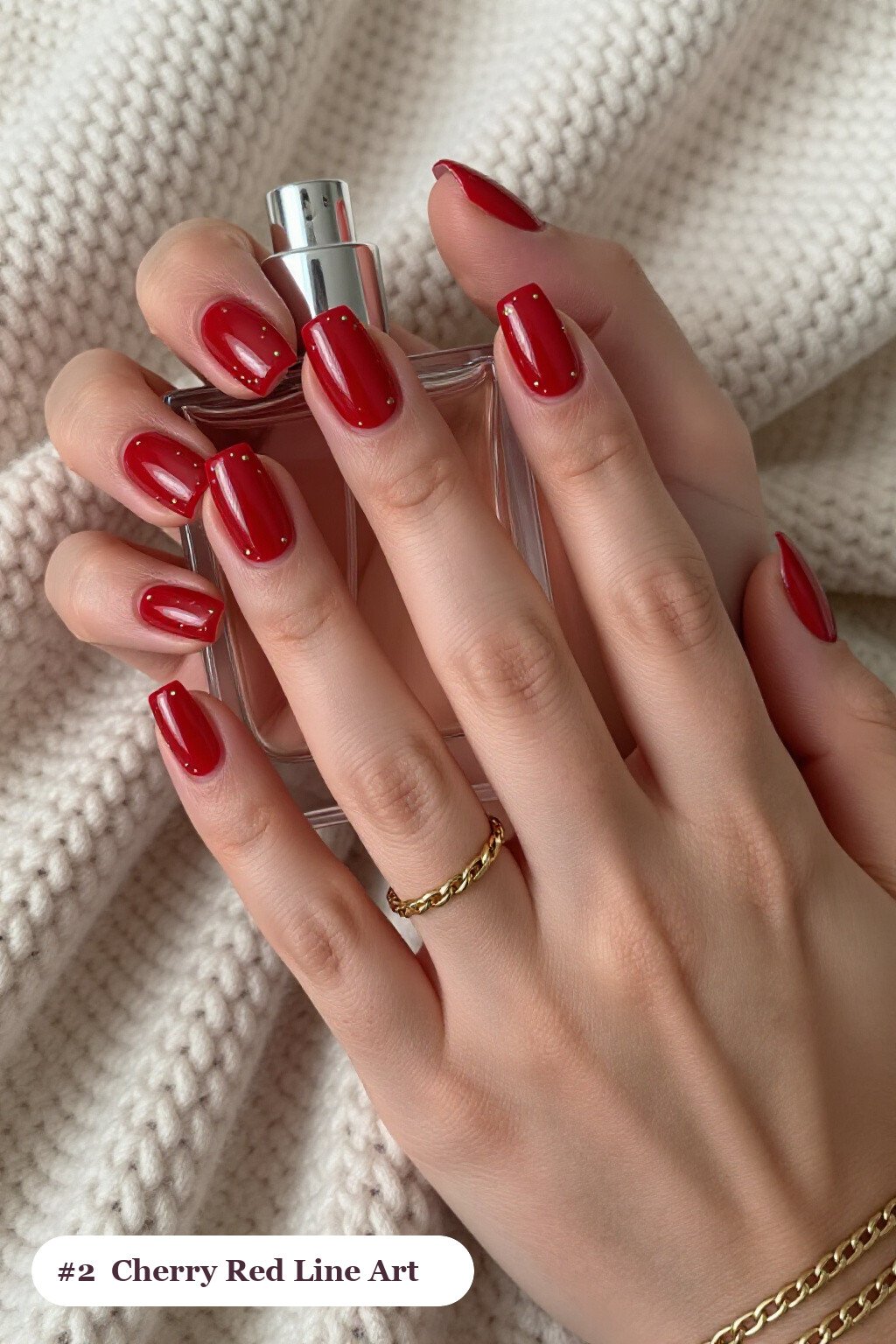 Medium square cherry red nails with fine gold line art and tiny dots drawn across every nail, perfect for christmas - christmas nail designs holiday