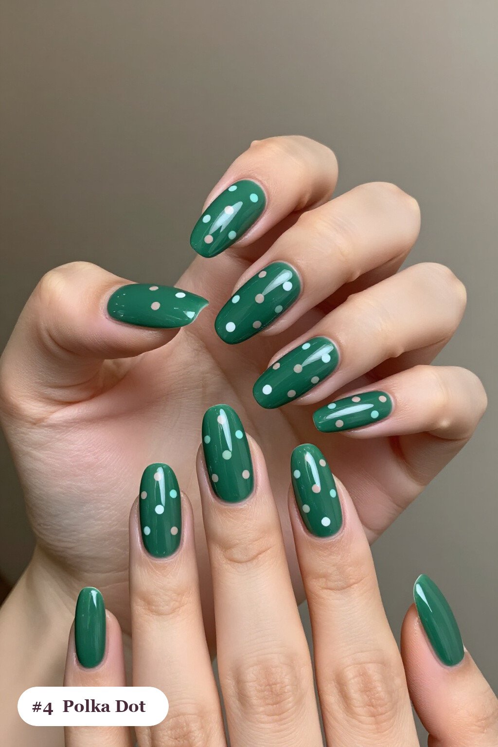 Long ballerina emerald green nails with playful polka dots in two colours on alternating nails, perfect for christmas - christmas nail designs holiday
