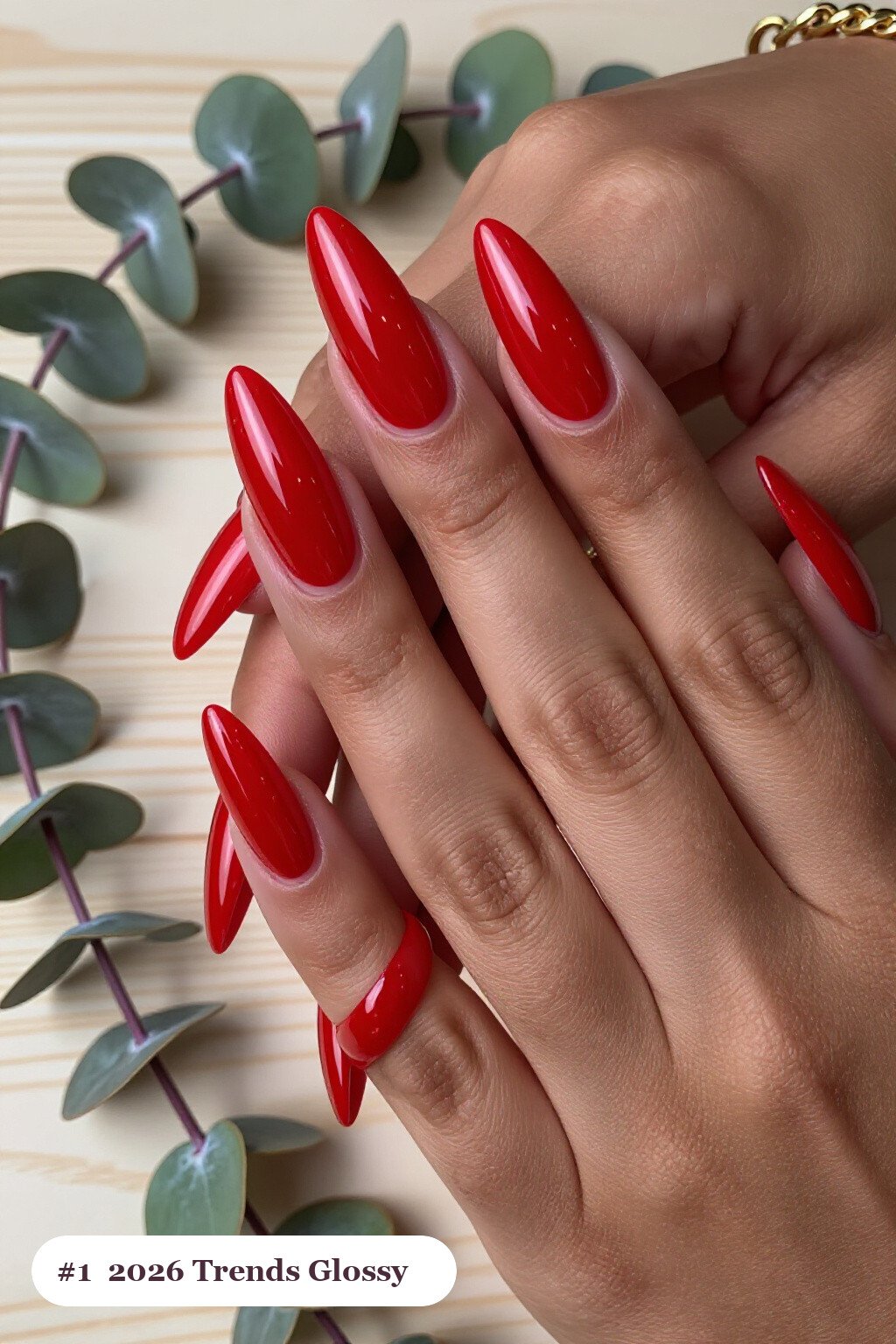 Long stiletto cherry red 2026 trends nails in a flawless mirror-glossy full-colour finish, perfect for christmas - christmas nails 2026 trends