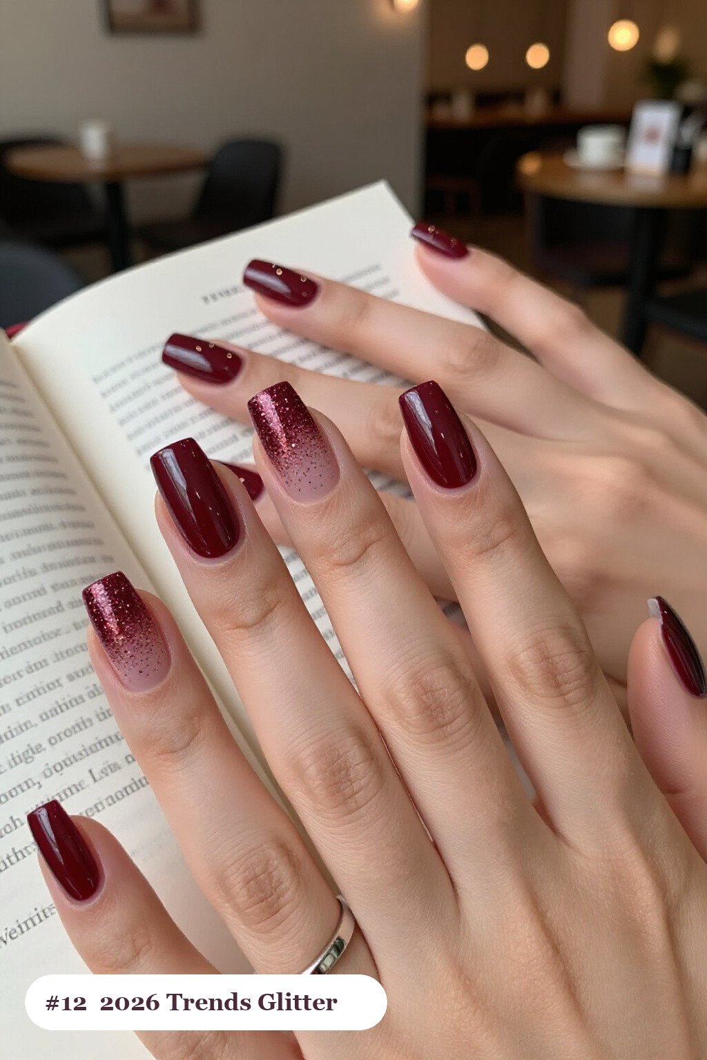 Medium square burgundy 2026 trends nails with a sparkling glitter gradient rising from the cuticle, perfect for christmas - christmas nails 2026 trends