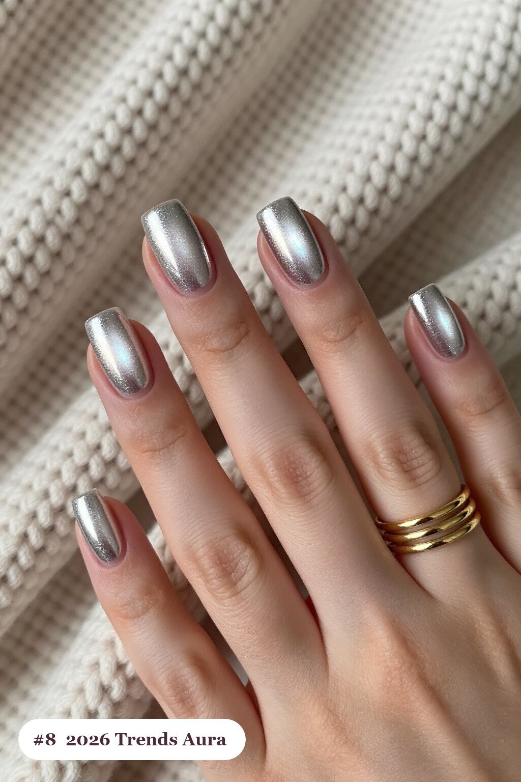Short square silver 2026 trends nails with a glowing airbrushed aura in the centre of each nail, perfect for christmas - christmas nails 2026 trends