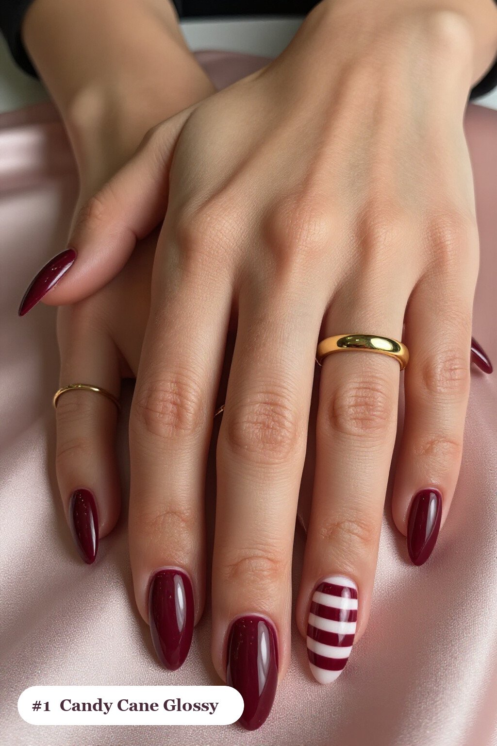 Burgundy Mirror‑Gloss Almond Nails: The Ultimate Christmas Nails Candy Cane Look - christmas nails candy cane