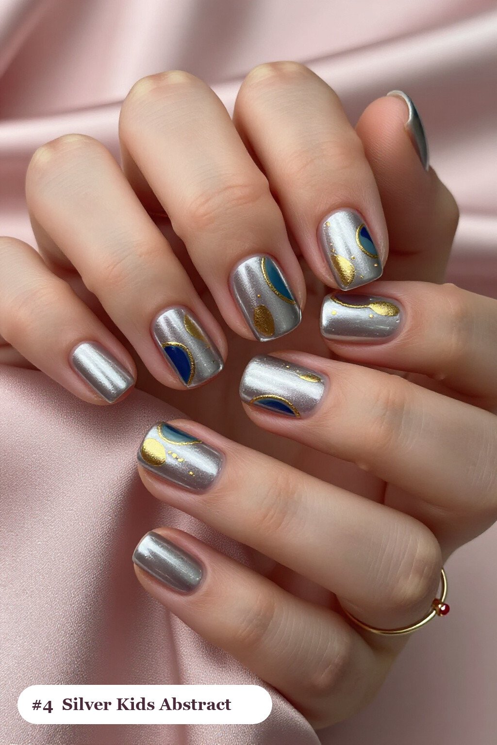 Medium Square Silver Christmas Nails for Kids Featuring Abstract Color Blobs and Gold Dots - christmas nails for kids