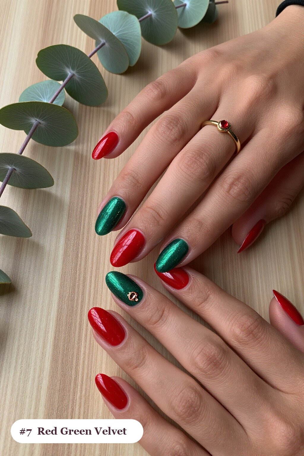 Medium coffin red green nails in a velvet shimmer finish with one glossy accent nail with a gold charm, with rose gold details, perfect for christmas - christmas nails red and green