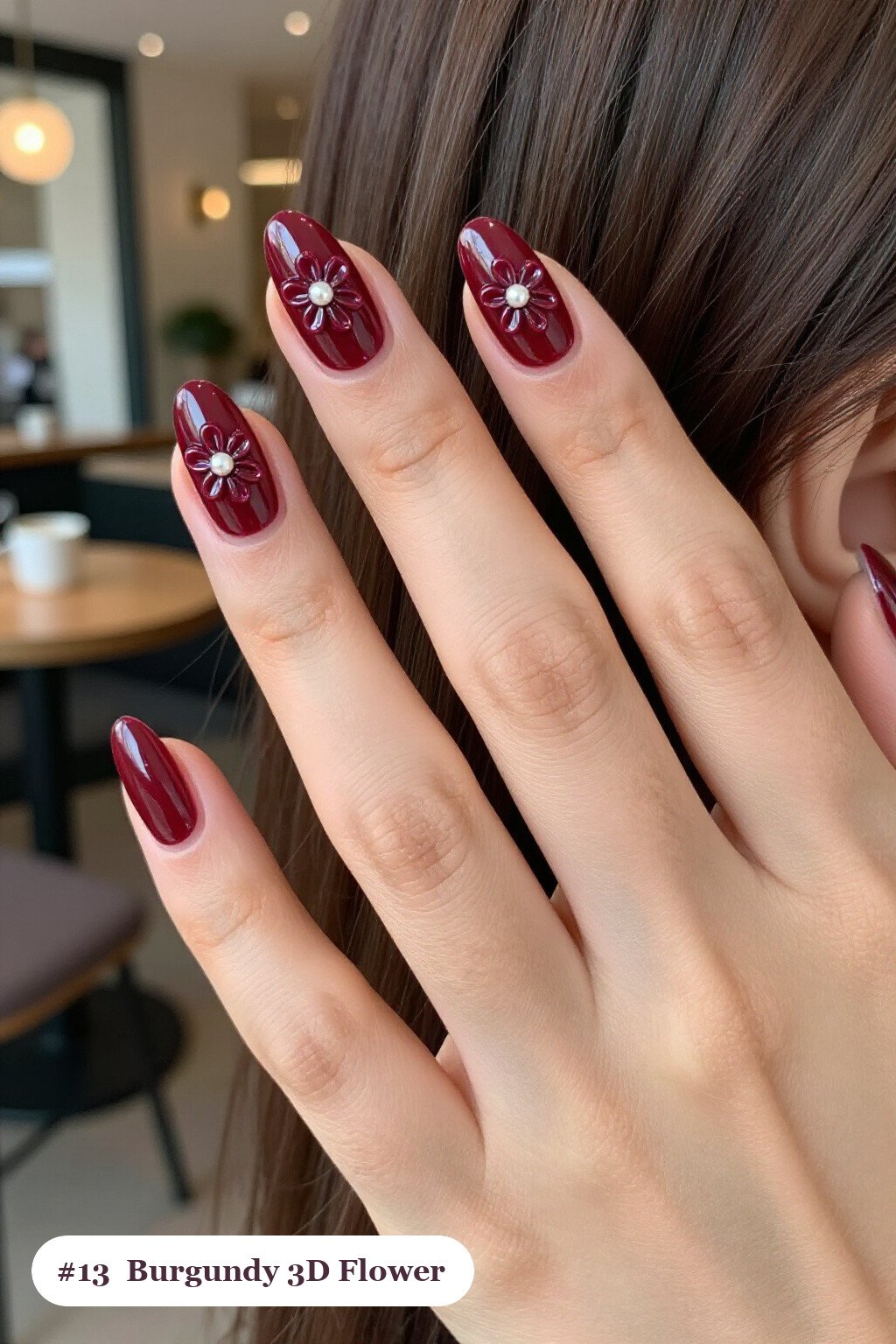 Burgundy Almond Nails with Raised 3D Flowers and Pearl Centres - christmas nails short