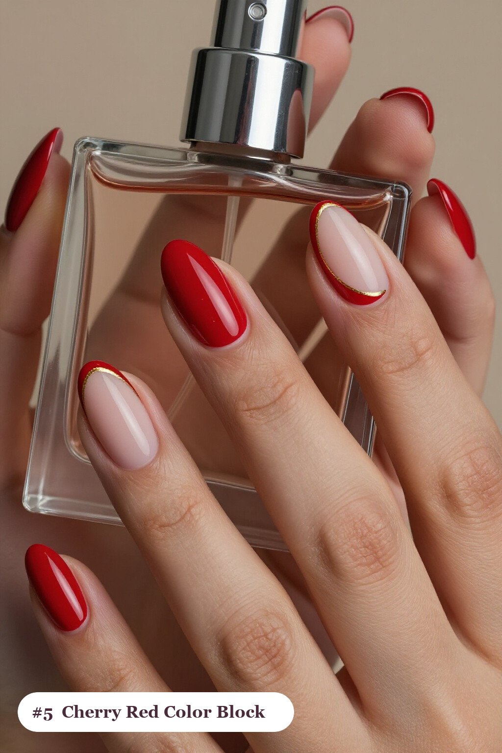 Cherry Red Almond Nails with Diagonal Colour‑Block and Thin Gold Line - christmas nails short