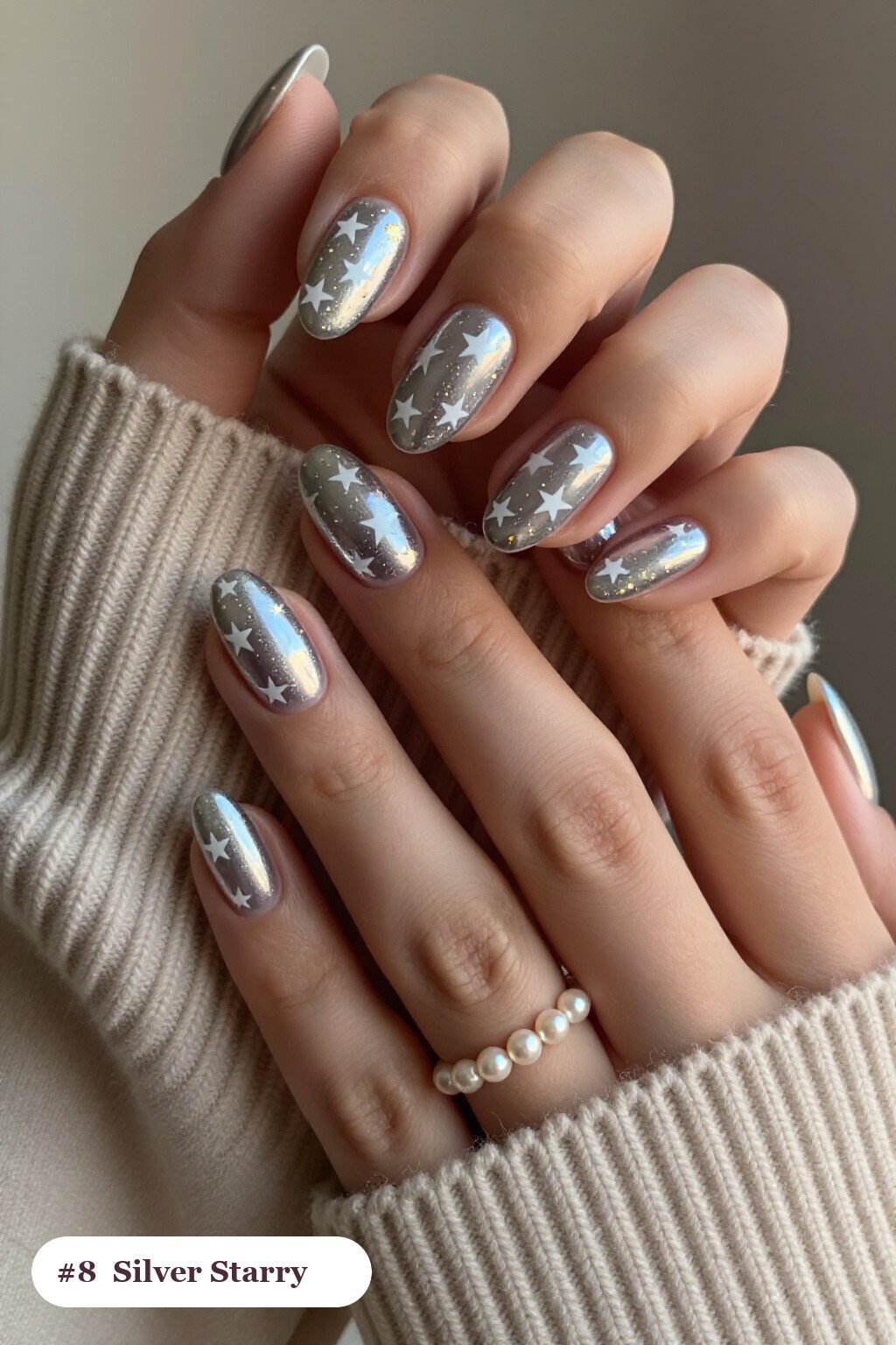 Silver Almond Nails Adorned with White and Gold Stars and Sparkles - christmas nails short