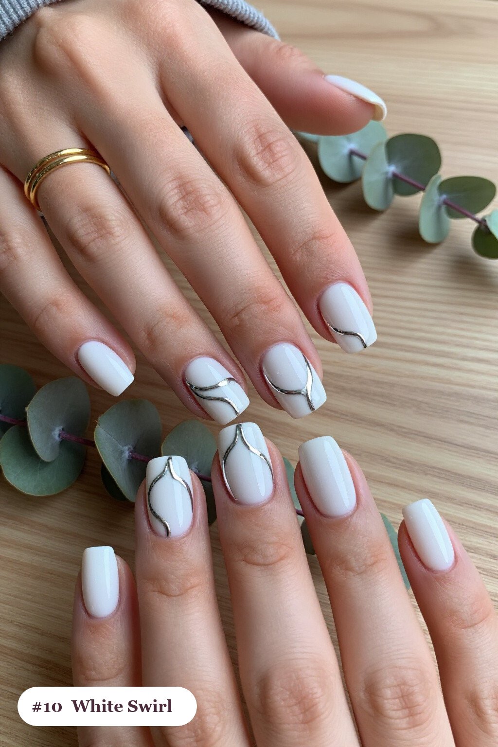 Bold Swirl Lines on Square Nails with Silver Chrome Details - christmas nails white