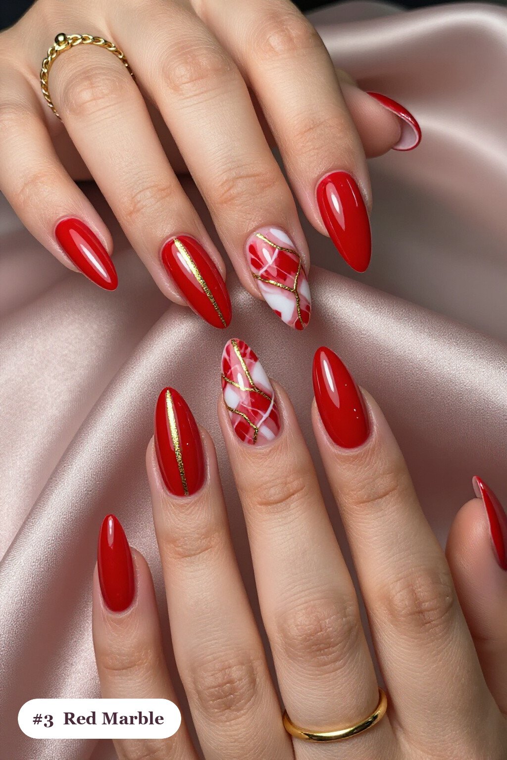 Long Stiletto Red Nails Featuring Bold White‑Gold Marble Veins - christmas red nails Long Stiletto Red Nails Featuring Bold White‑Gold Marble Veins - christmas red nails