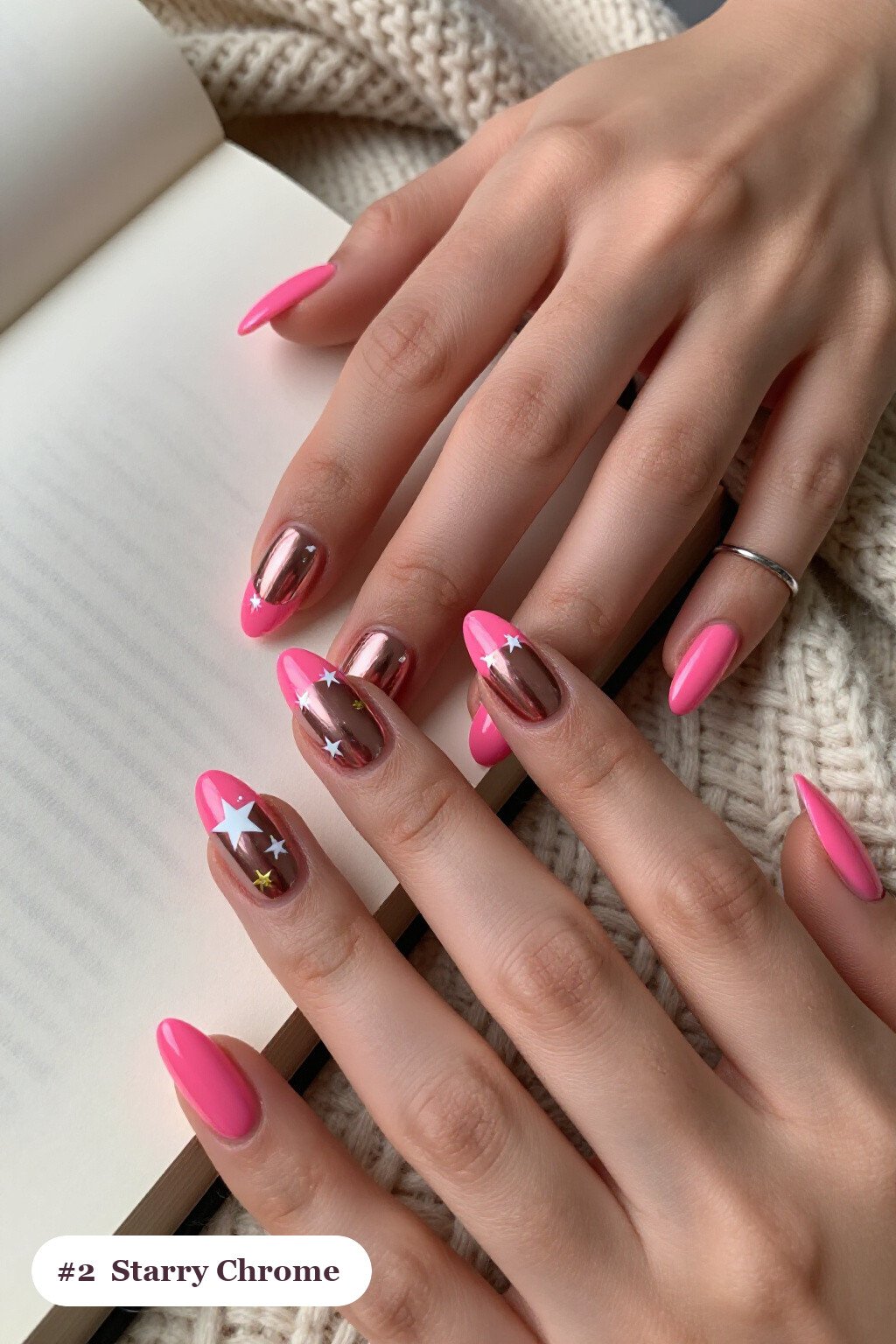 Medium square hot pink coffee chrome nails with a liquid chrome mirror finish clearly visible on every nail, styled with white and gold stars and sparkles painted on every nail - coffee chrome nails