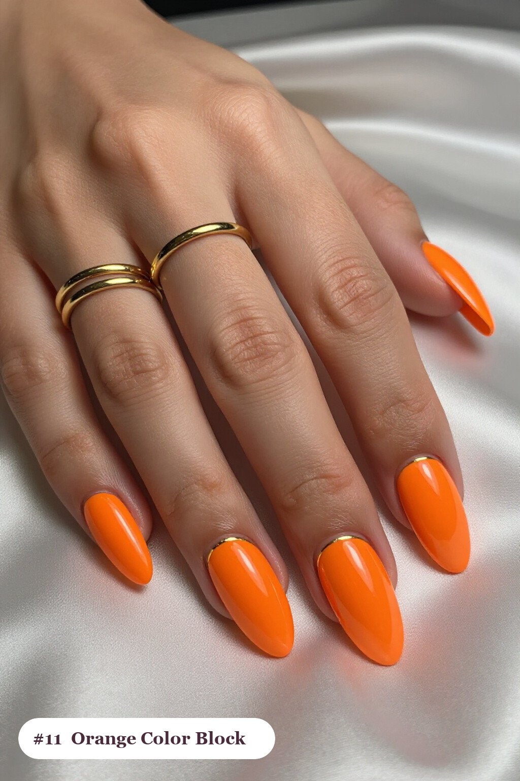 Long Coffin Orange Nails in Diagonal Colour‑Block Design with Thin Gold Line - cute halloween nails