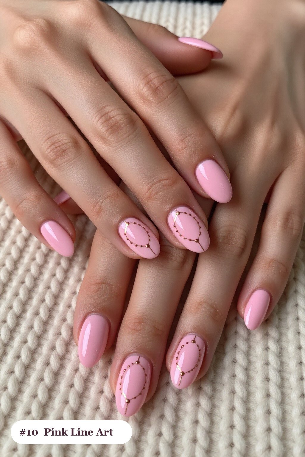 Medium oval pink nails with fine gold line art and tiny dots drawn across every nail, with rose gold details, perfect for halloween - cute halloween nails pink