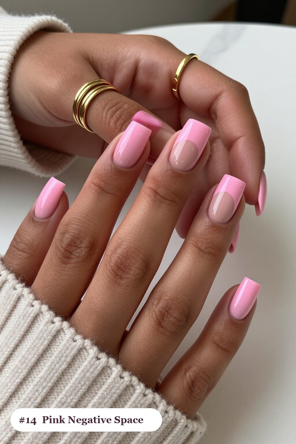 Short square pink nails in a negative-space design with sheer nude windows and bold colour shapes, with soft nude details, perfect for halloween - cute halloween nails pink