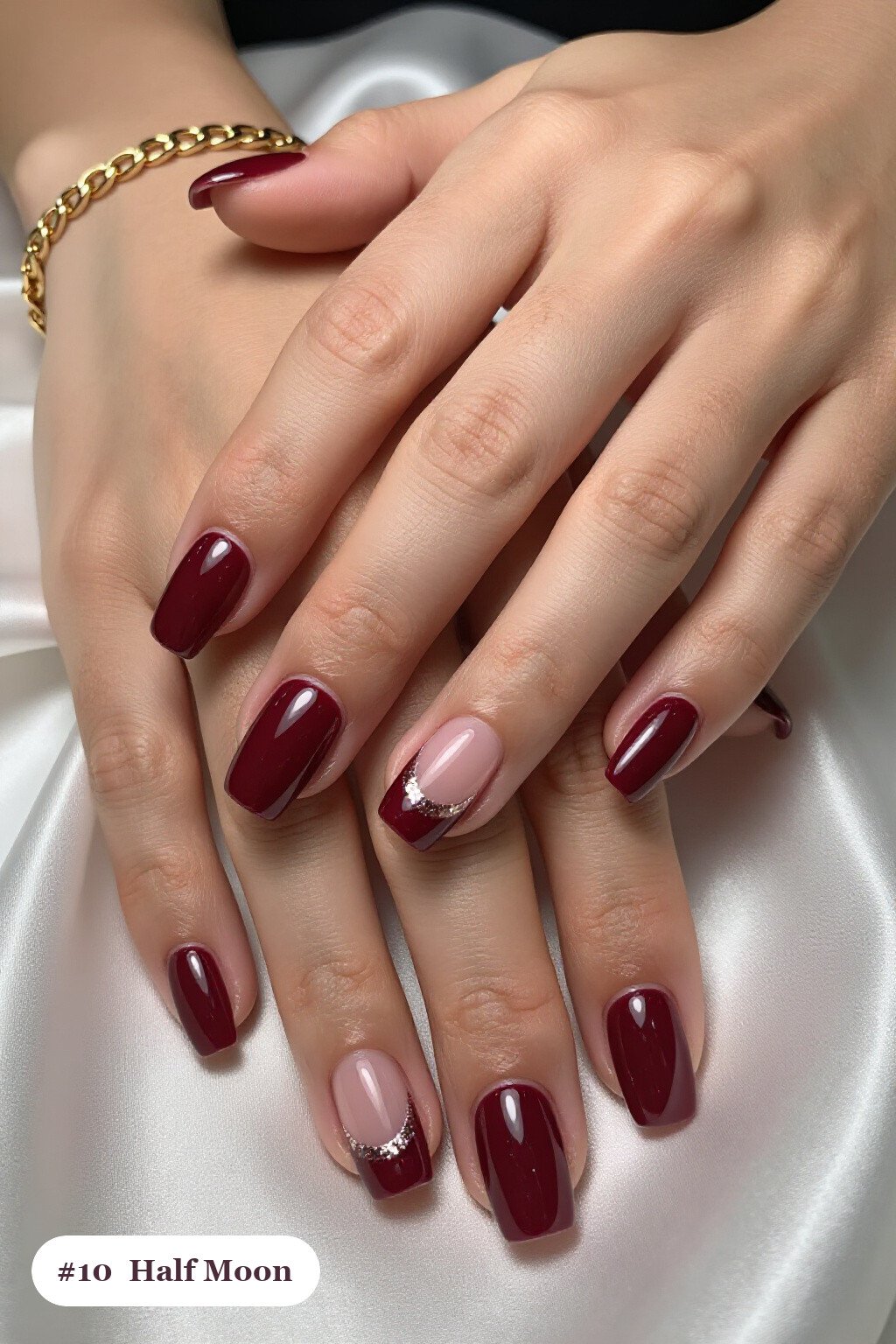 Medium square burgundy early nails in a half-moon design with a glitter crescent at the cuticle, perfect for fall - early fall nail designs