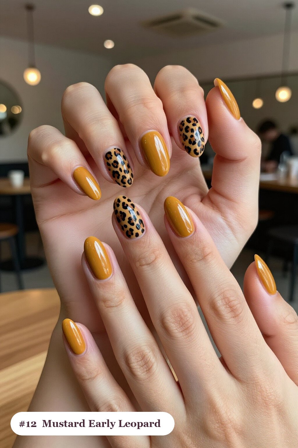 Medium almond mustard early nails with a leopard print pattern on two accent nails and solid colour on the rest, perfect for fall - early fall nail designs
