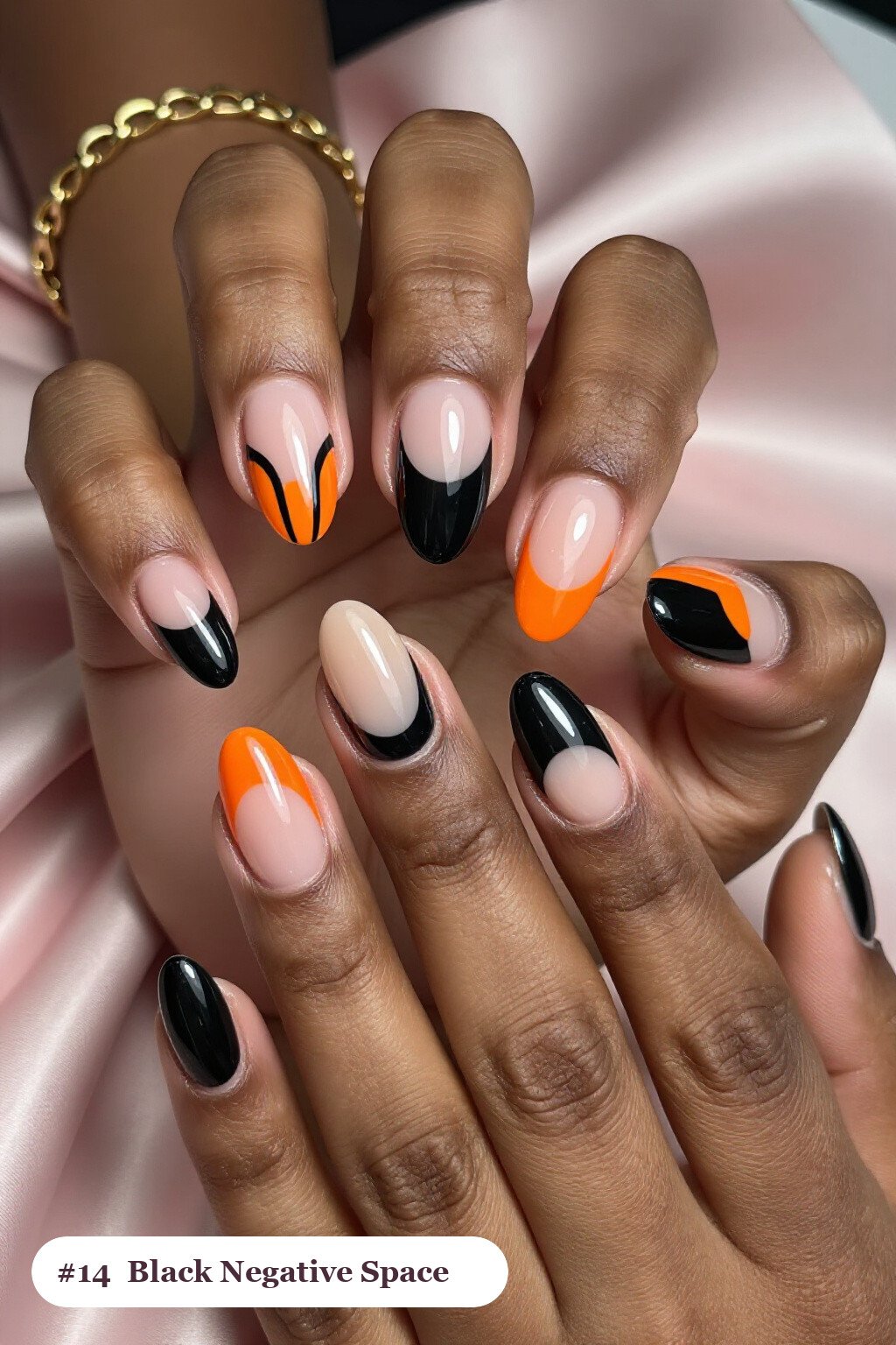 Black Oval Nails with Negative‑Space Nude Windows and Bold Colour Shapes: On Short Nails - easy halloween nail ideas