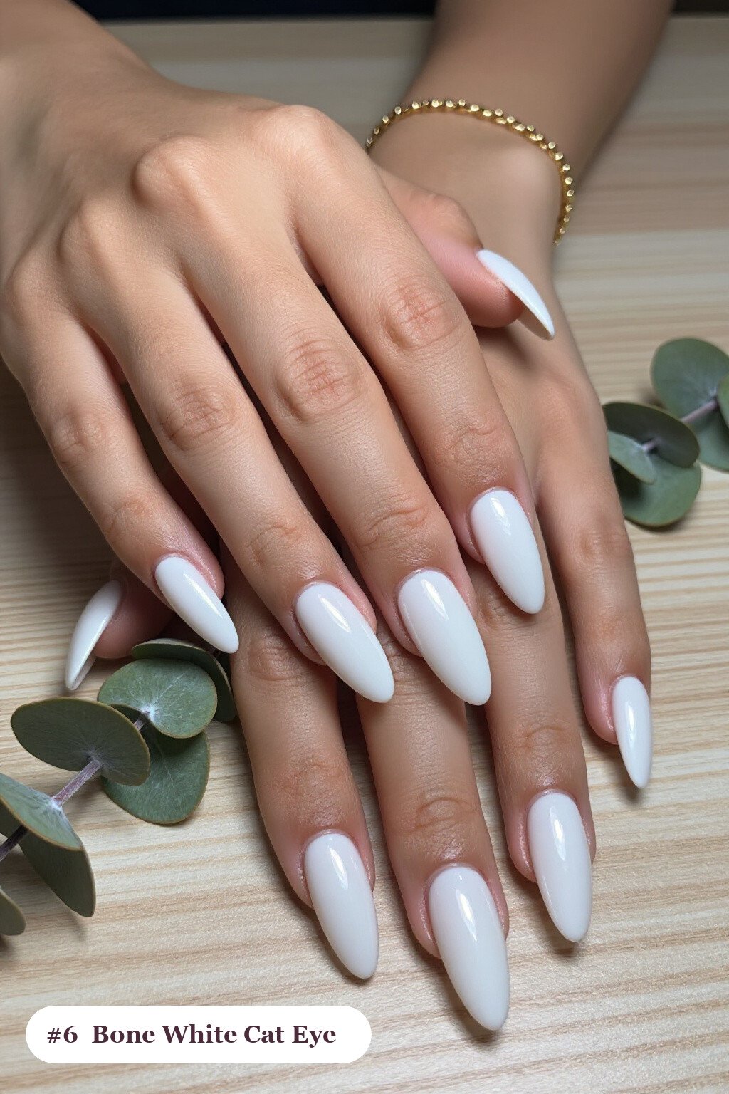 Bone‑White Almond Nails with a Glowing Gem‑Like Shimmer Band: Best Shades for Every Season - easy halloween nail ideas