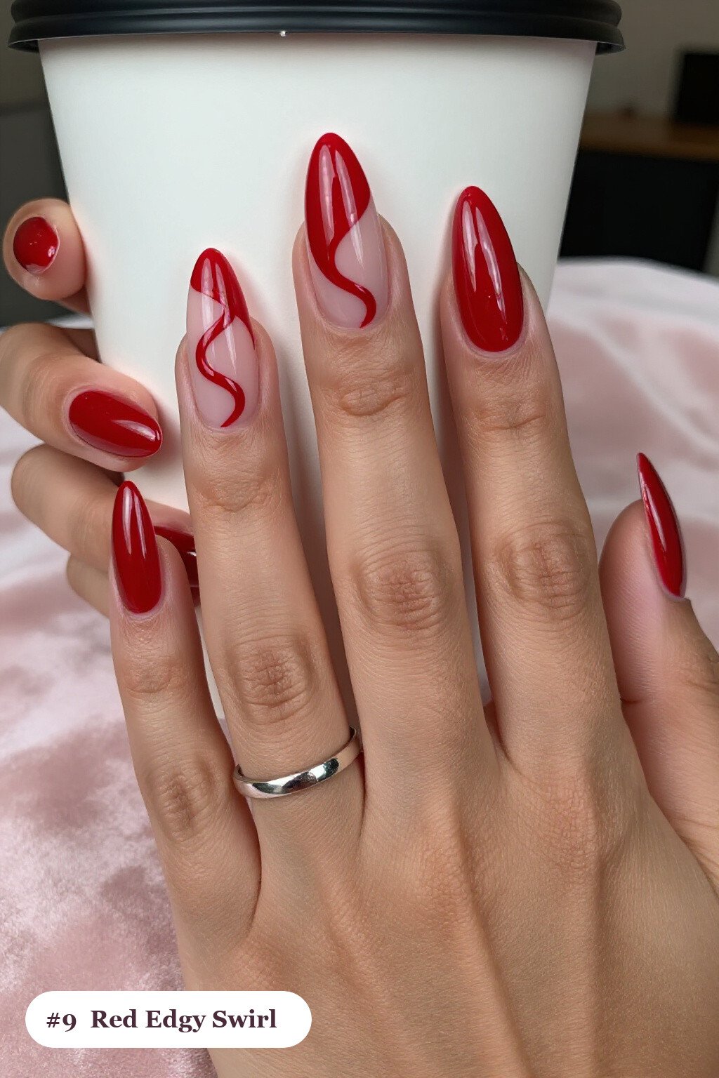 Long Ballerina Blood Red Nails with Bold Hand‑Painted Swirl Lines - edgy halloween nail ideas